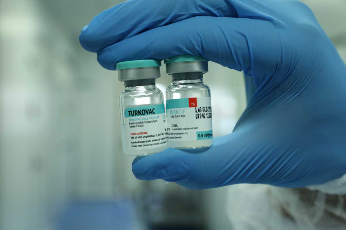 A health worker holds vials of Turkey's domestically developed Turkovac COVID-19 vaccine at the vaccine's manufacturing facility in Sanliurfa, Turkey December 22, 2021. Turkish Health Ministry