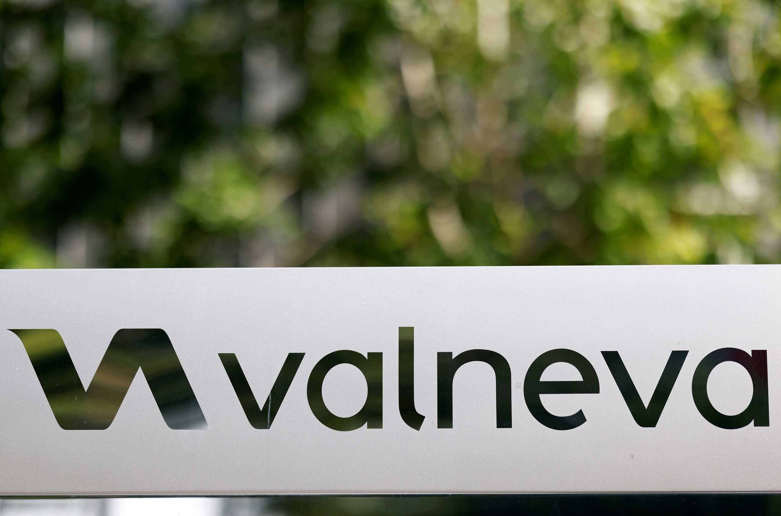 FILE PHOTO: The logo of Valneva SE is pictured at the company's headquarters in Saint-Herblain, near Nantes, France, September 13, 2021. REUTERS
