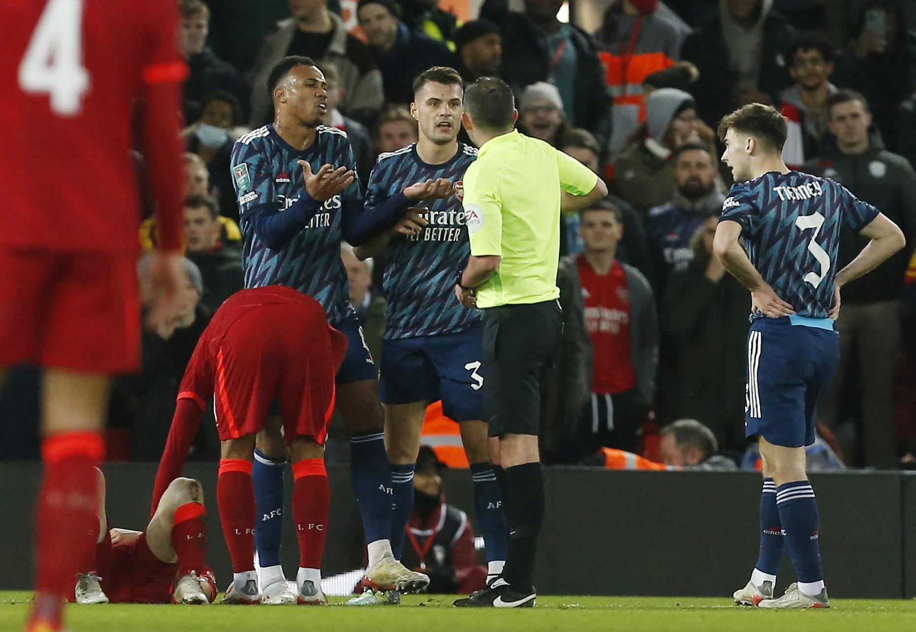 Soccer Football - Carabao Cup - Semi-Final - First Leg - Liverpool v Arsenal - Anfield, Liverpool, Britain - January 13, 2022  Arsenal's Granit Xhaka reacts before being shown a red card by referee Michael Oliver REUTERS