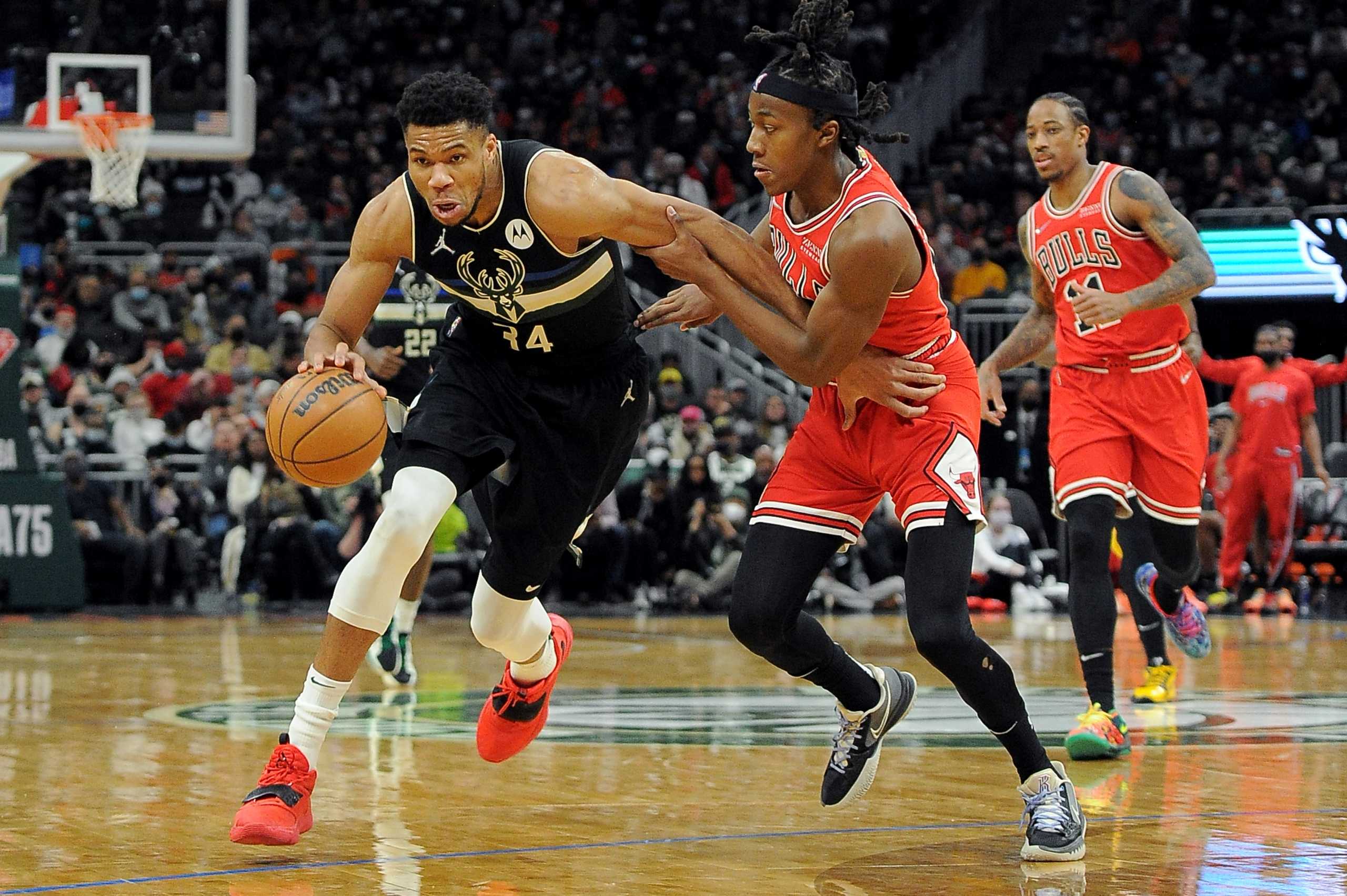 Jan 21, 2022; Milwaukee, Wisconsin, USA;  Milwaukee Bucks forward Giannis Antetokounmpo (34) drives to the basket against Chicago Bulls guard Ayo Dosunmu (12) in the second half at Fiserv Forum. Mandatory Credit: Michael McLoone-USA TODAY Sports