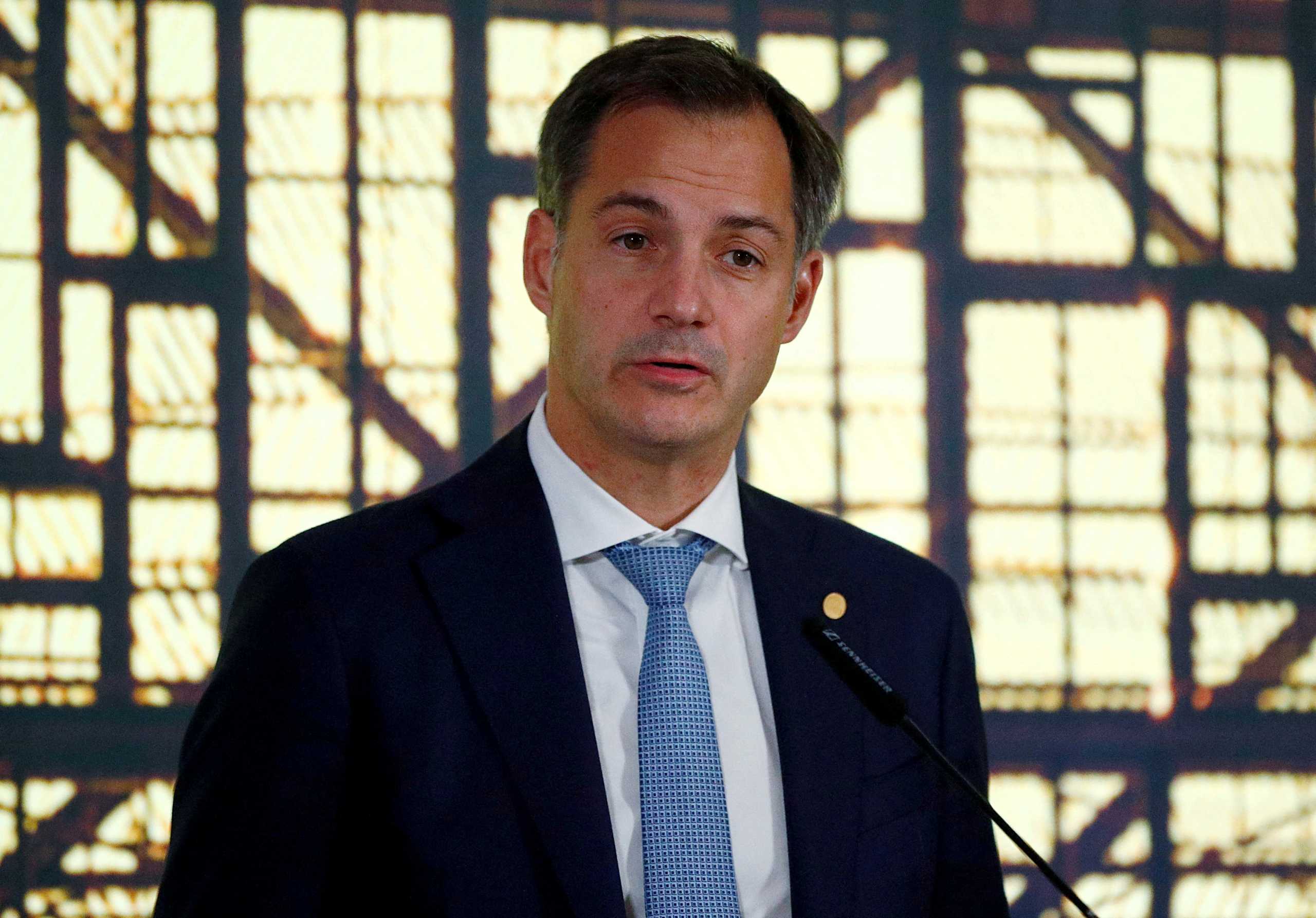 FILE PHOTO: Belgian Prime Minister Alexander de Croo speaks during a news conference after a face-to-face EU summit in Brussels, Belgium, October 22, 2021. REUTERS