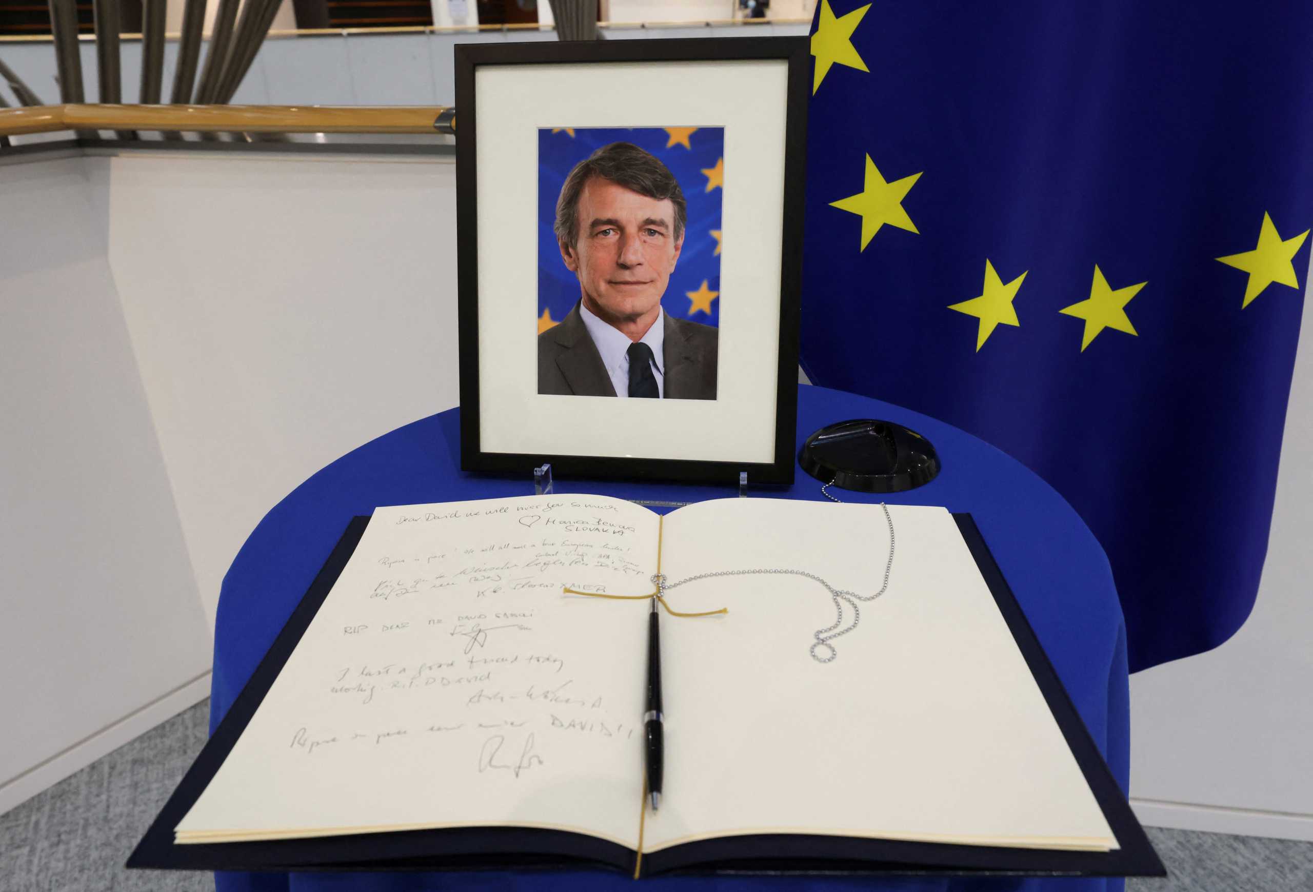 A condolence book and a picture of late European Parliament President David Sassoli are seen at the European Parliament building, in Brussels, Belgium January 11, 2022. REUTERS