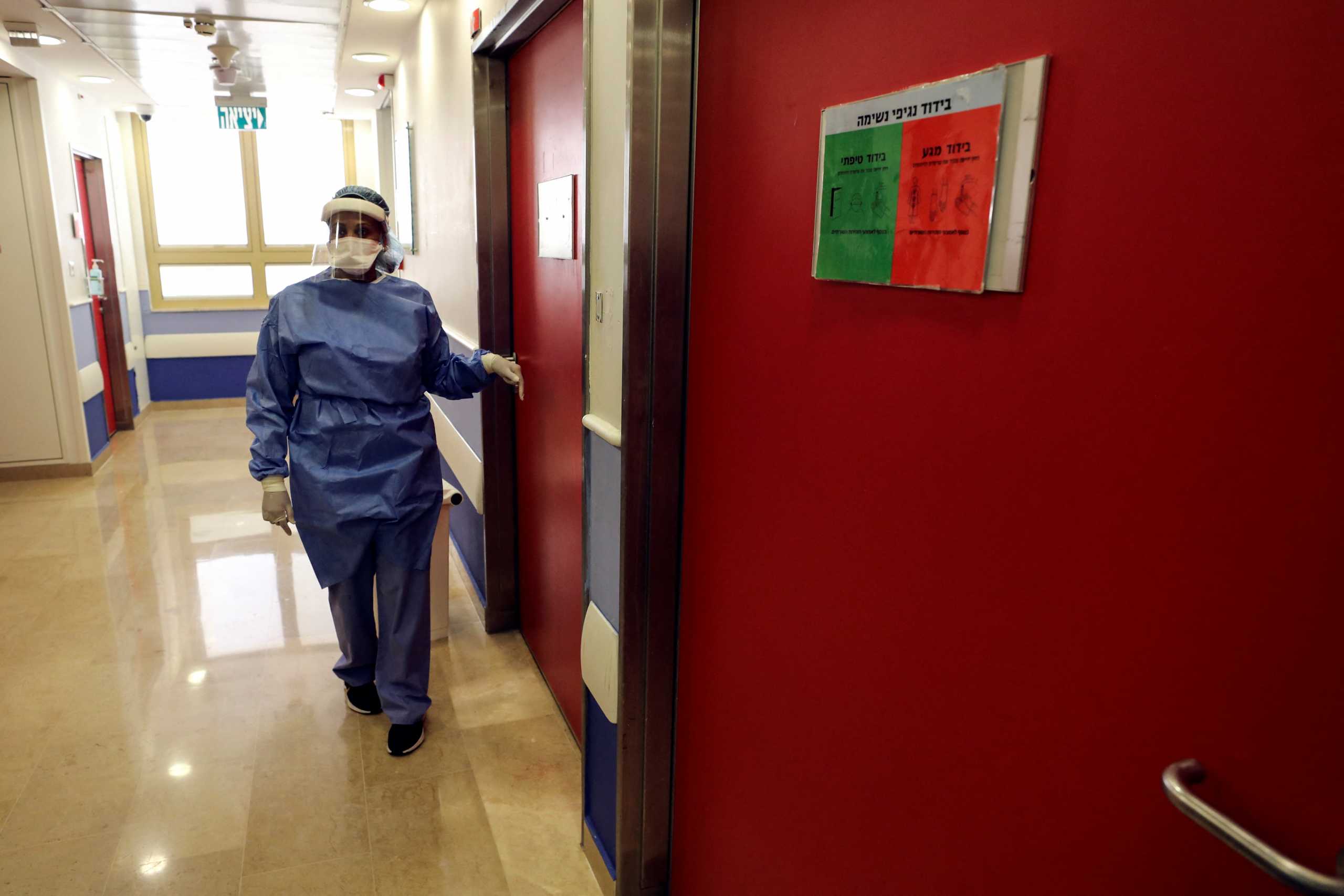 A medical worker walks through a dedicated children's coronavirus disease (COVID-19) ward which reopened as a response to increased infections among Israel's children at Sheba Medical Center in Ramat Gan, Israel January 11, 2022. REUTERS