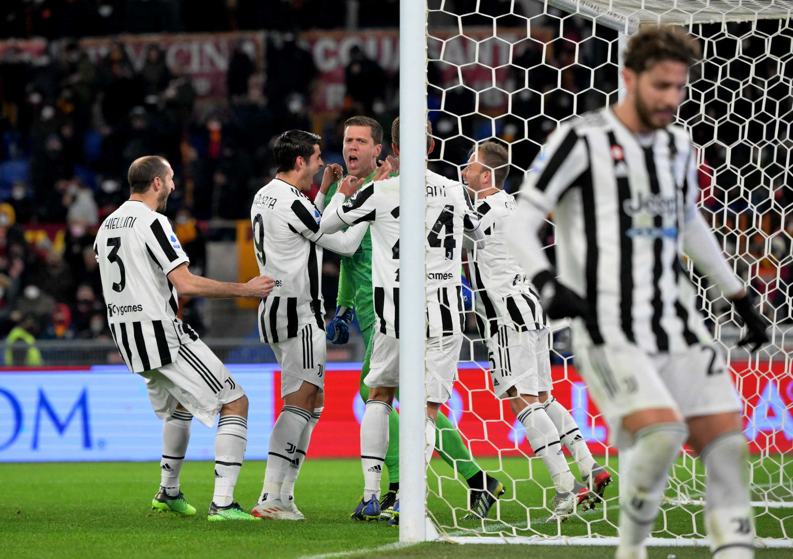 Soccer Football - Serie A - AS Roma v Juventus - Stadio Olimpico, Rome, Italy - January 9, 2022 Juventus' Wojciech Szczesny, Daniele Rugani, Alvaro Morata and Giorgio Chiellini celebrate after AS Roma's Lorenzo Pellegrini misses a chance to score from the penalty position REUTERS
