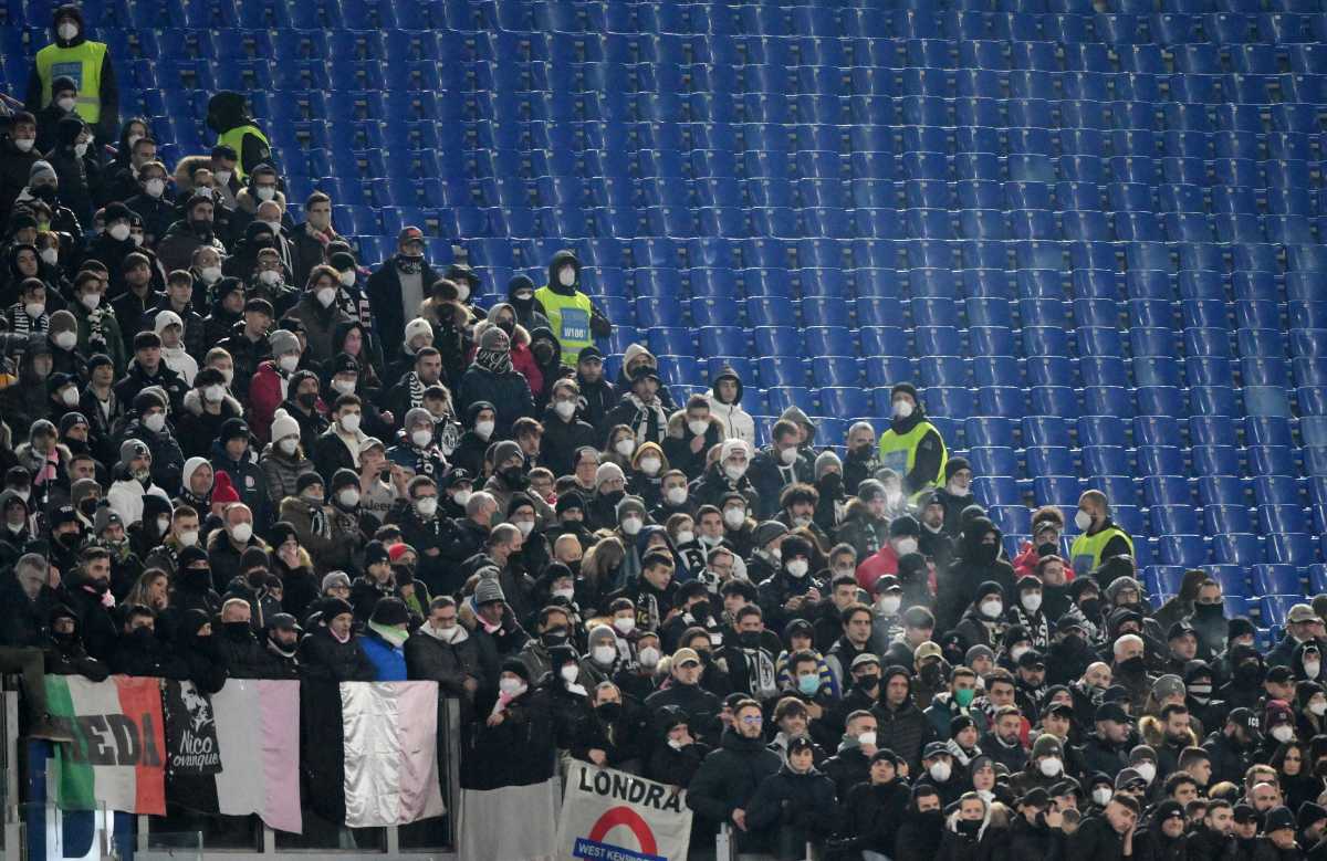 Soccer Football - Serie A - AS Roma v Juventus - Stadio Olimpico, Rome, Italy - January 9, 2022 AS Roma fans wearing protective face masks during the match REUTERS