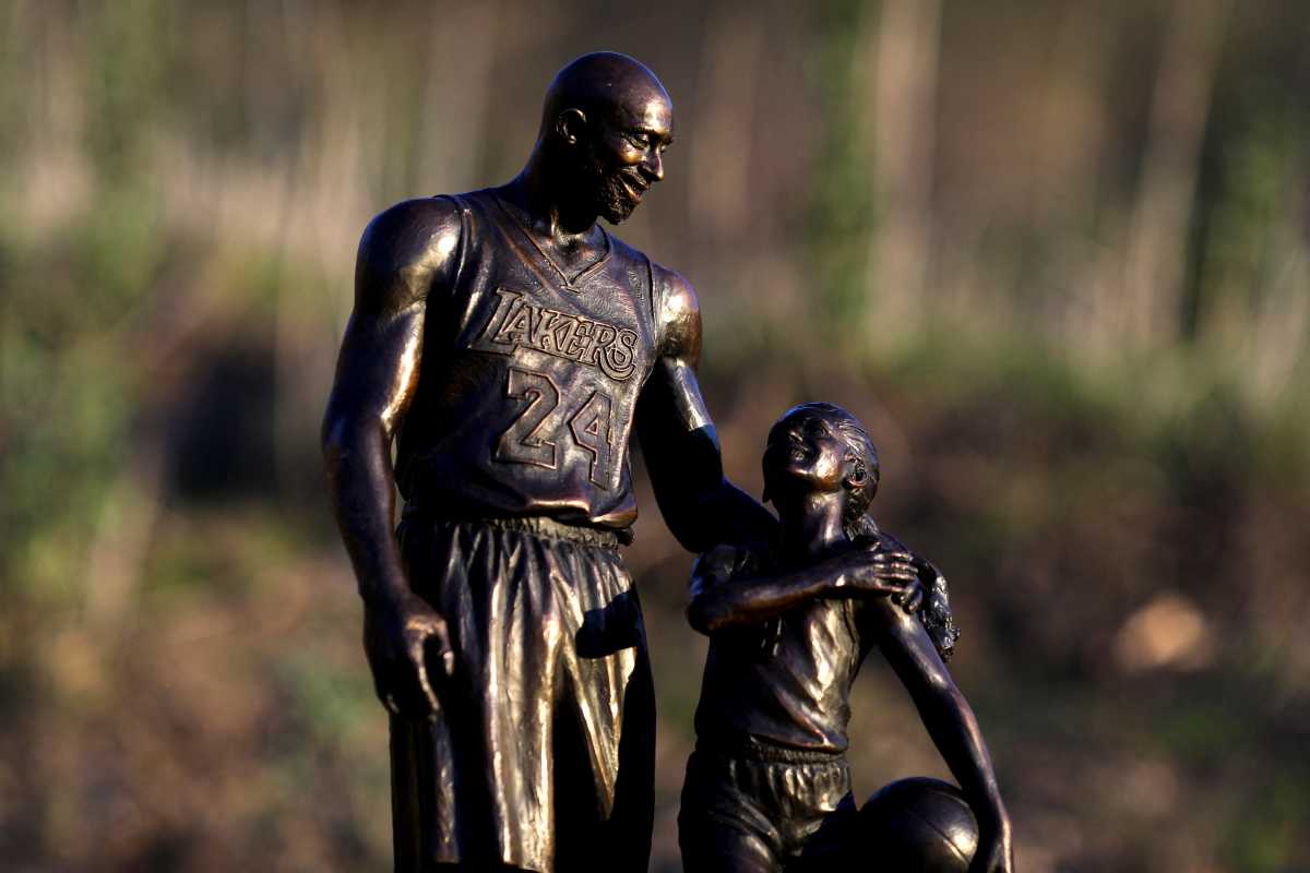Los Angeles sculptor Dan Medina has honored the anniversary of the deaths of Kobe and Gigi Bryant along with seven other passengers by placing a temporary statue of the two where their helicopter crashed two years ago today in Calabasas, California, U.S., January 26, 2022. REUTERS