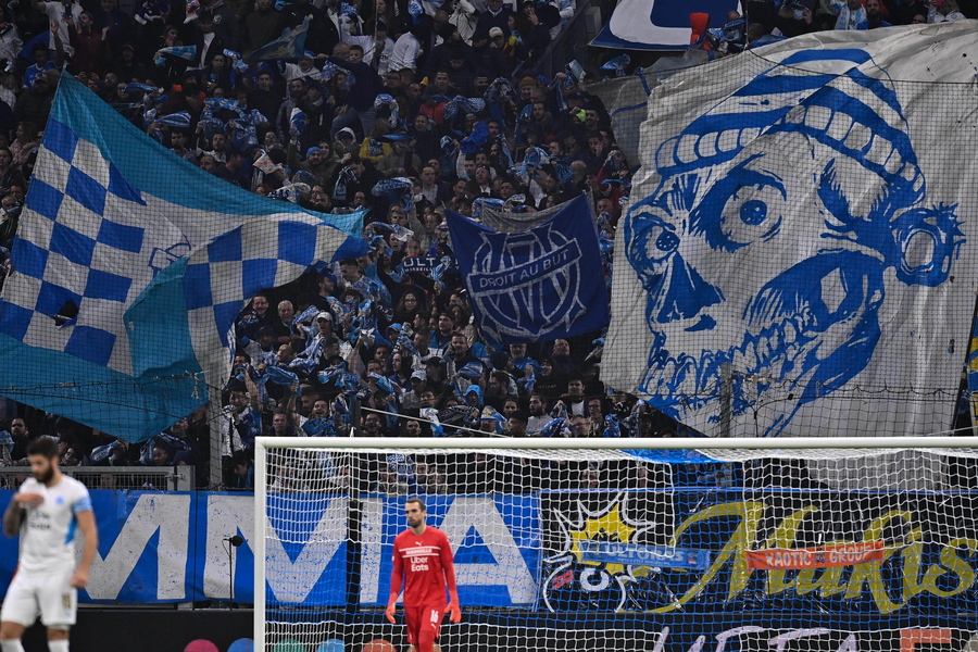 epa09564937 Fans of Olympique Marseille during the UEFA Europa League Group E soccer match between Olympique Marseille and SS Lazio at the Velodrome Stadium in Marseille, southern France, 04 November 2021.  EPA