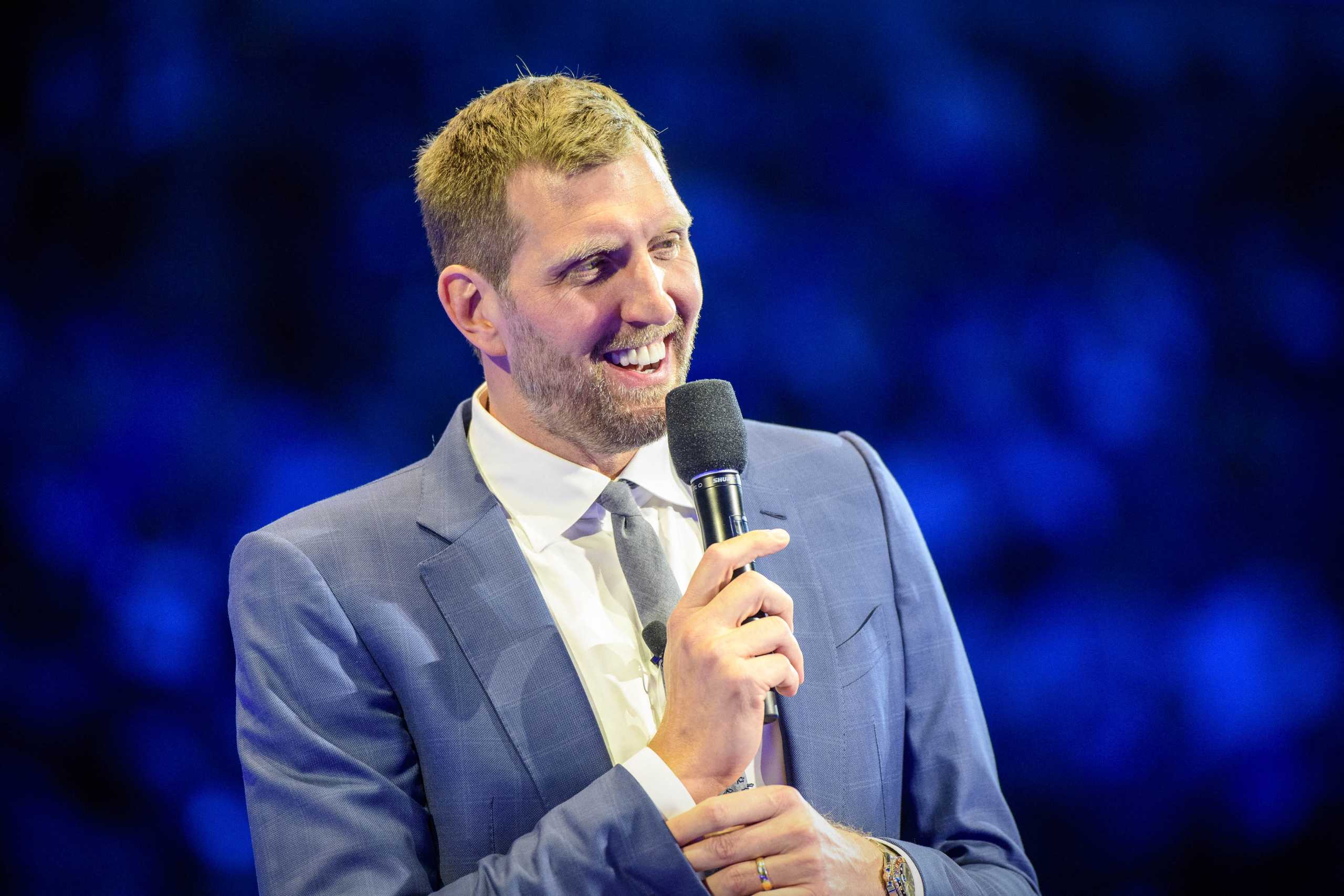 Jan 5, 2022; Dallas, Texas, USA; Former Dallas Mavericks player Dirk Nowitzki speaks to the fans as Nowitzki has his number 41 jersey retired after the game between the Dallas Mavericks and the Golden State Warriors at the American Airlines Center. Mandatory Credit: Jerome Miron-USA TODAY Sports