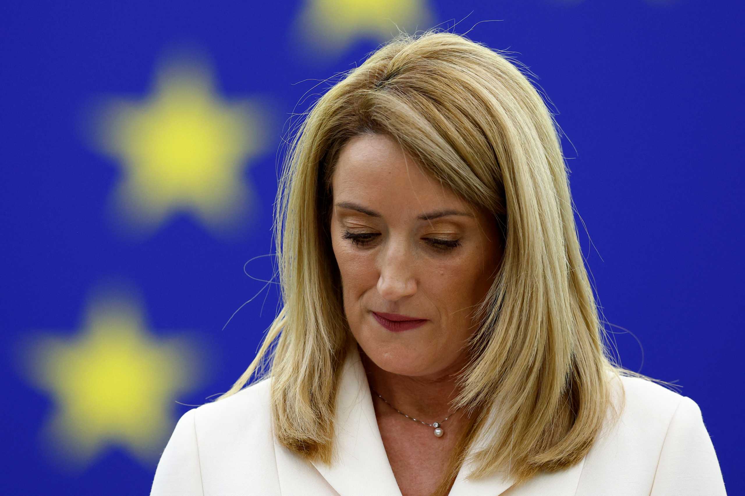 Newly-elected president of the European Parliament Roberta Metsola reacts as she delivers a speech during a plenary session in Strasbourg, France, January 18, 2022. REUTERS