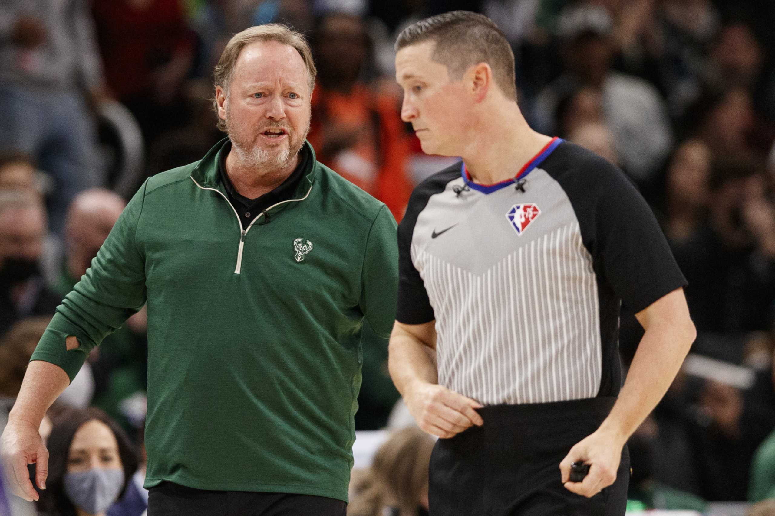 Dec 25, 2021; Milwaukee, Wisconsin, USA;  Milwaukee Bucks head coach Mike Budenholzer talks with an official during the fourth quarter against the Boston Celtics at Fiserv Forum. Mandatory Credit: Jeff Hanisch-USA TODAY Sports