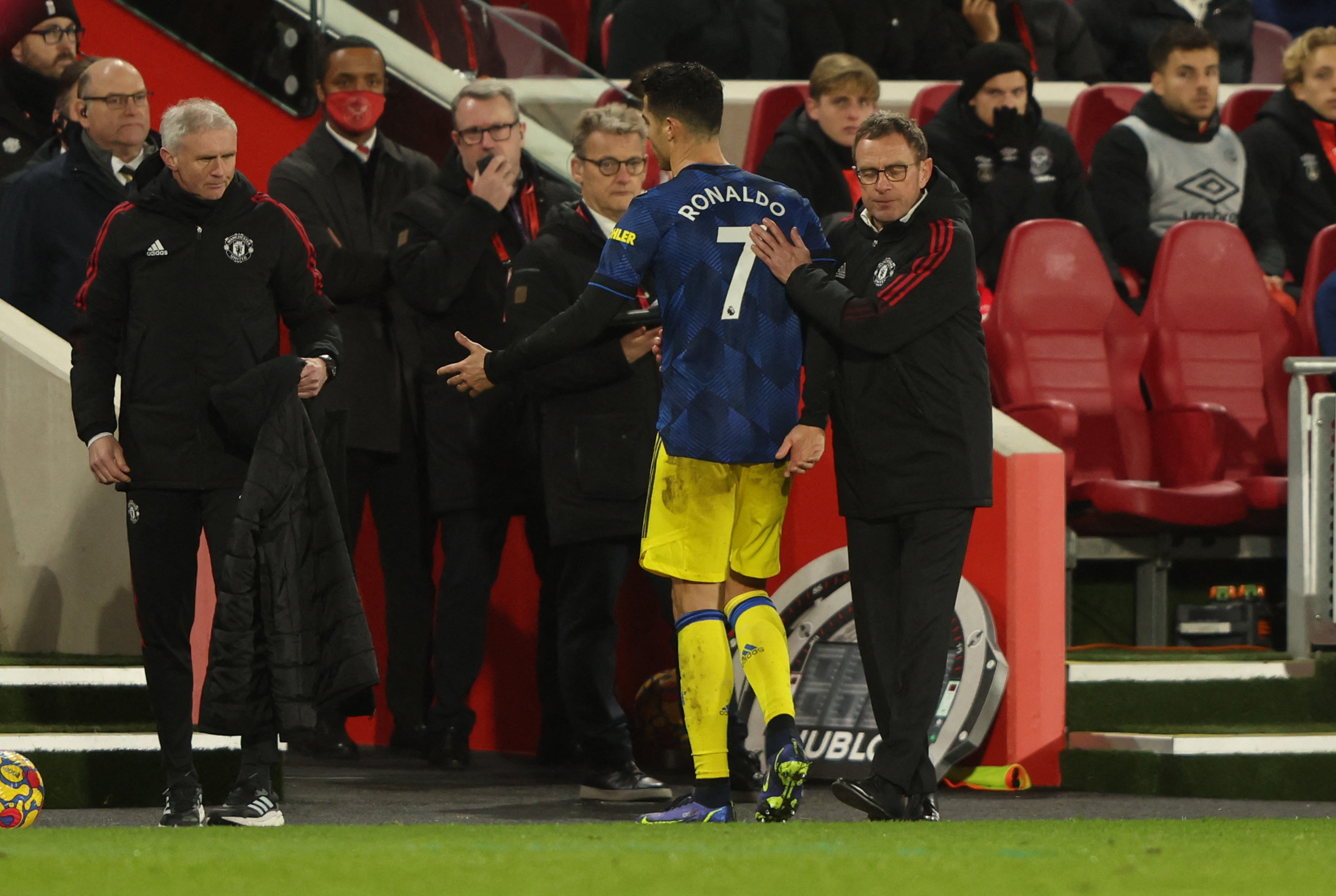 Soccer Football - Premier League - Brentford v Manchester United - Brentford Community Stadium, London, Britain - January 19, 2022 Manchester United's Cristiano Ronaldo with interim manager Ralf Rangnick after being substituted REUTERS