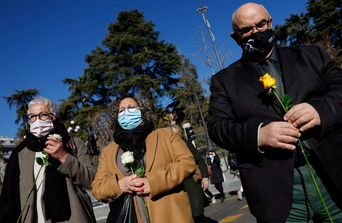 Angela Arreba, Enriqueta Lopez and Amnesty International's director Esteban Beltran attend a tribute to the Spanish nursing-home residents who died during COVID-19's devastating first wave in Madrid, Spain, January 31, 2022. REUTERS