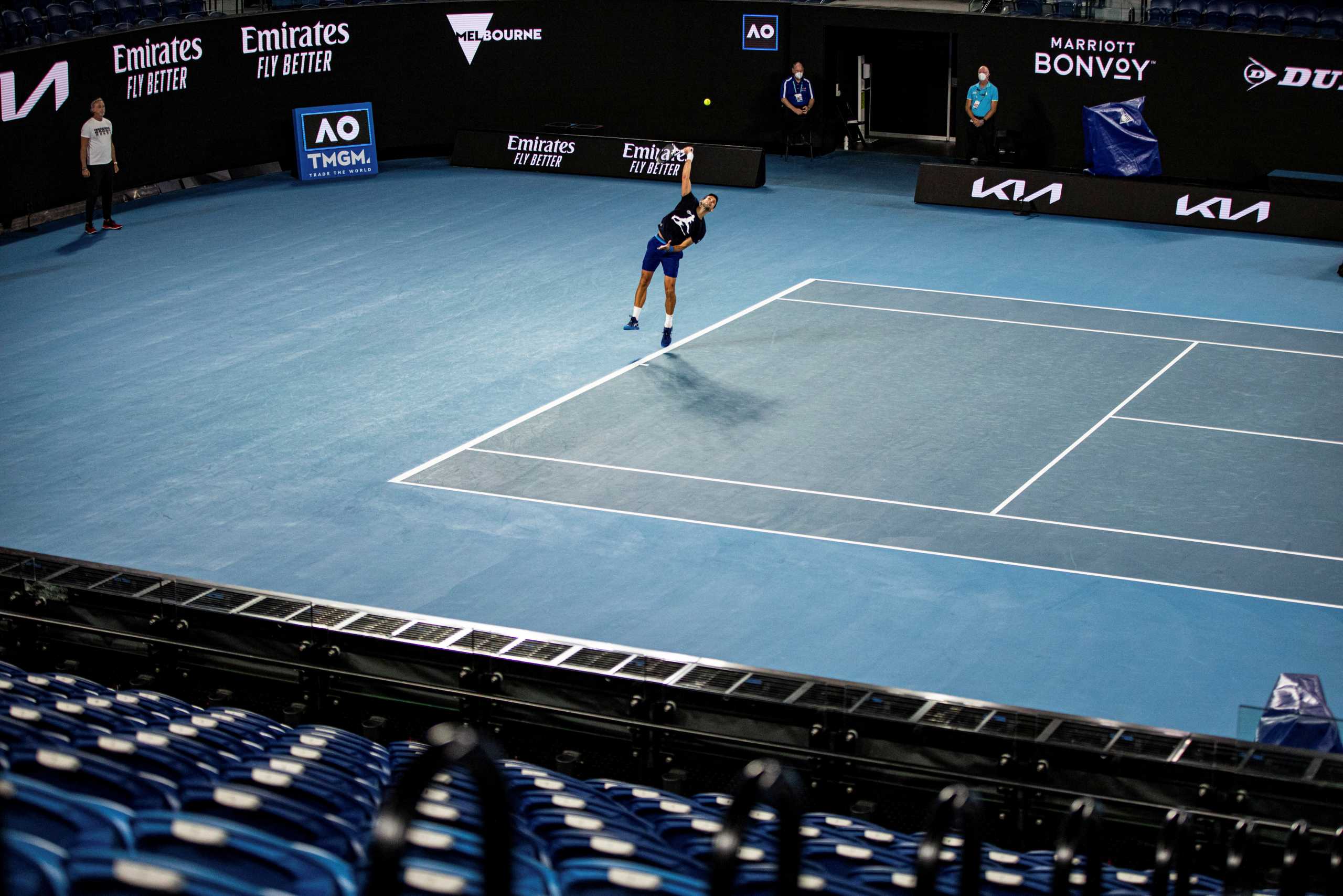 Serbian tennis player Novak Djokovic practices at Melbourne Park as questions remain over the legal battle regarding his visa to play in the Australian Open in Melbourne, Australia, January 14, 2022.  AAP Image