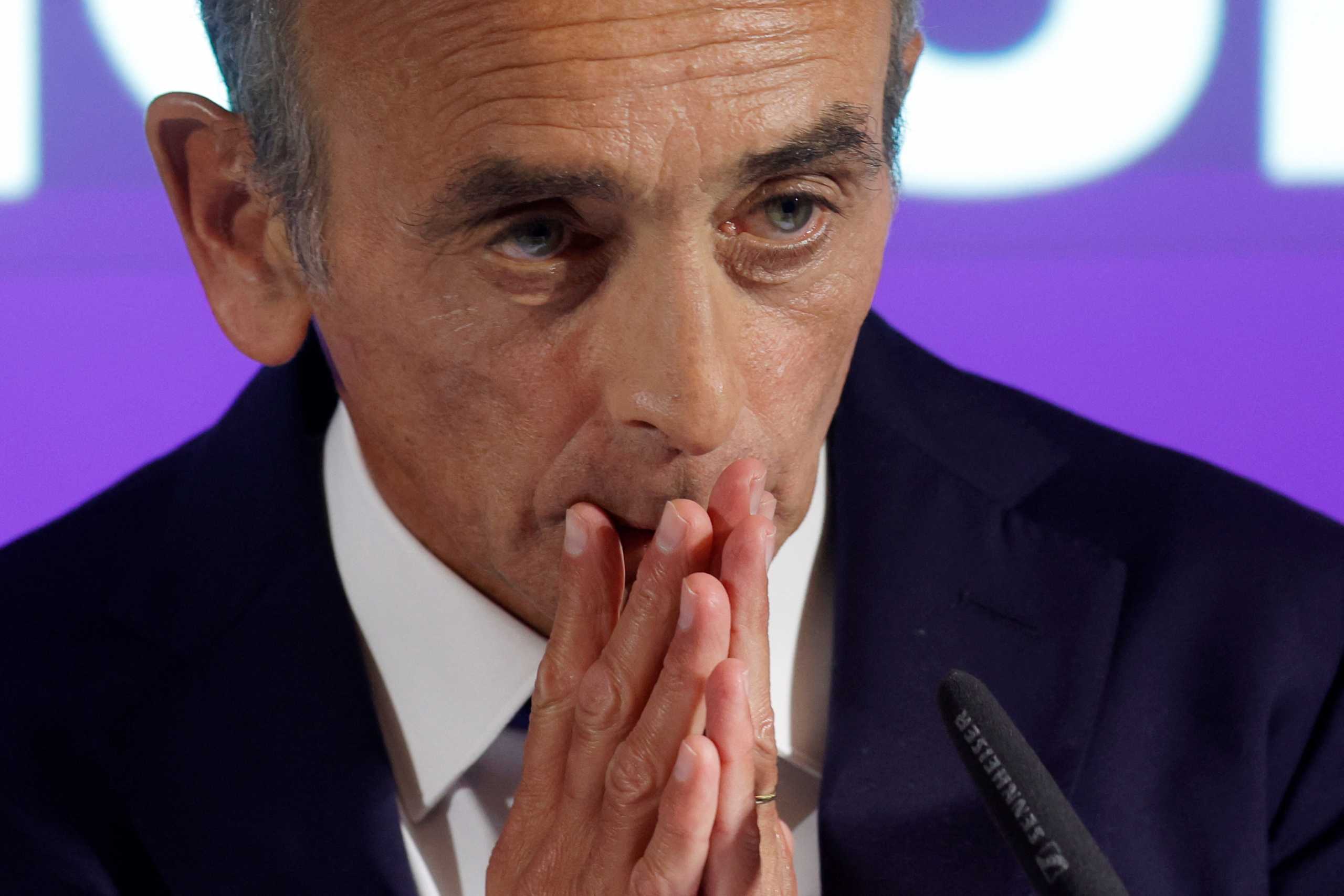 French far-right commentator Eric Zemmour, candidate for the 2022 French presidential election, gestures as he delivers a New Year's speech to the press in Paris, France, January 10, 2022. REUTERS