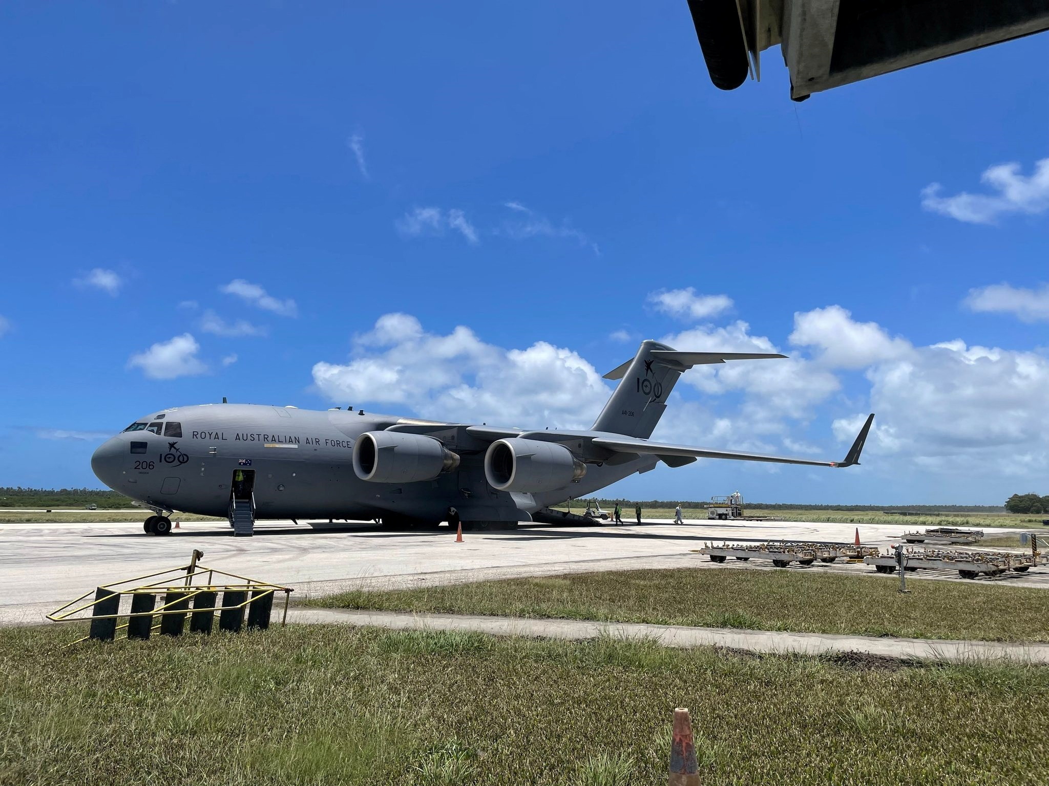 A Royal Australian Air Force C-17A Globemaster III aircraft delivers the first load of Australian Aid at Tonga's Fua'Amotu international airport January 20, 2022. Australian Department of Defence
