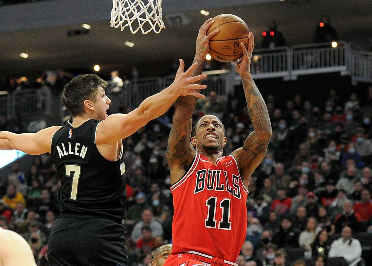 Jan 21, 2022; Milwaukee, Wisconsin, USA;  Chicago Bulls forward DeMar DeRozan (11) drives to the basket against Milwaukee Bucks guard Grayson Allen (7) in the first half at Fiserv Forum. Mandatory Credit: Michael McLoone-USA TODAY Sports
