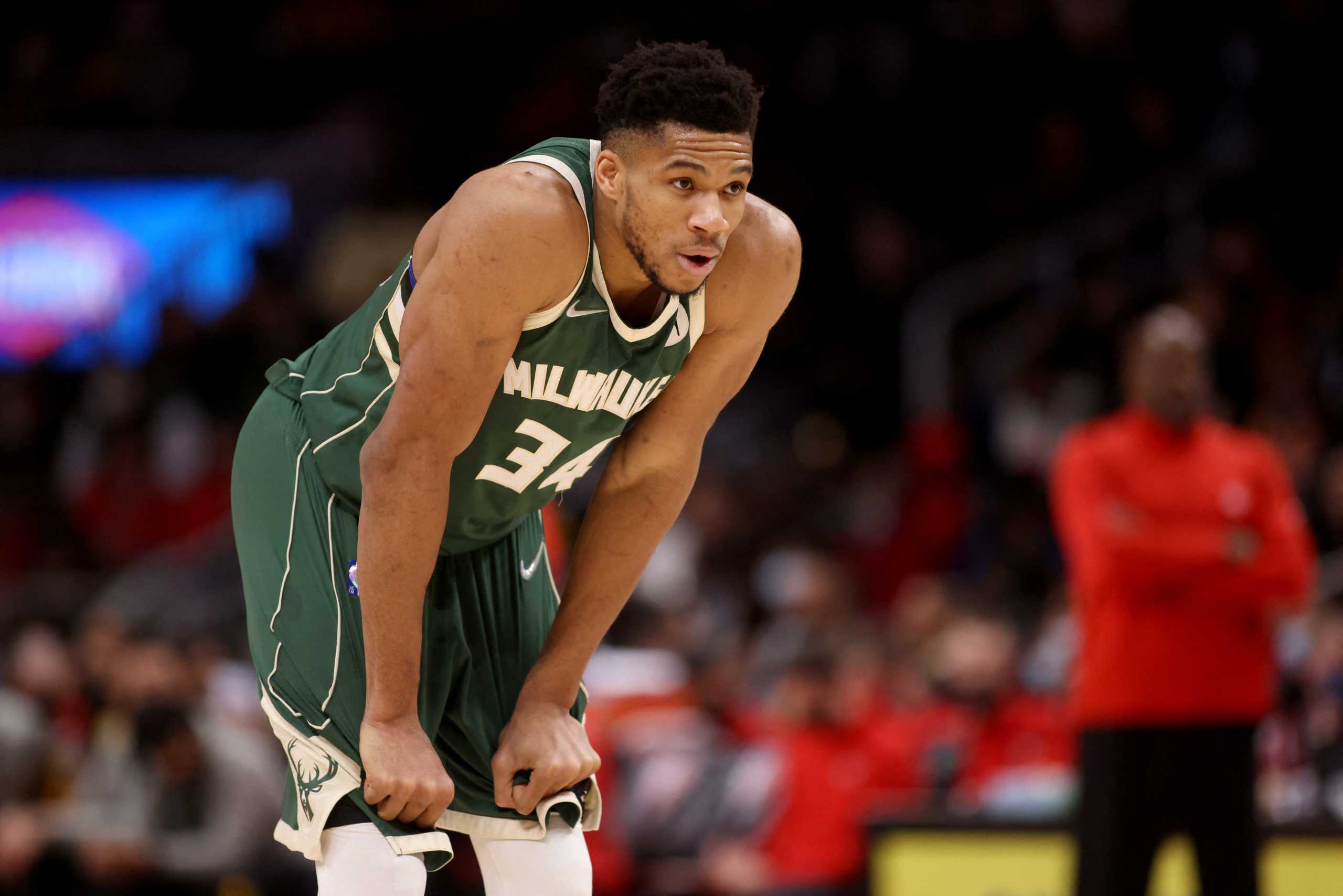 Jan 17, 2022; Atlanta, Georgia, USA; Milwaukee Bucks forward Giannis Antetokounmpo (34) reacts after getting fouled during the fourth quarter against the Atlanta Hawks at State Farm Arena. Mandatory Credit: Jason Getz-USA TODAY Sports