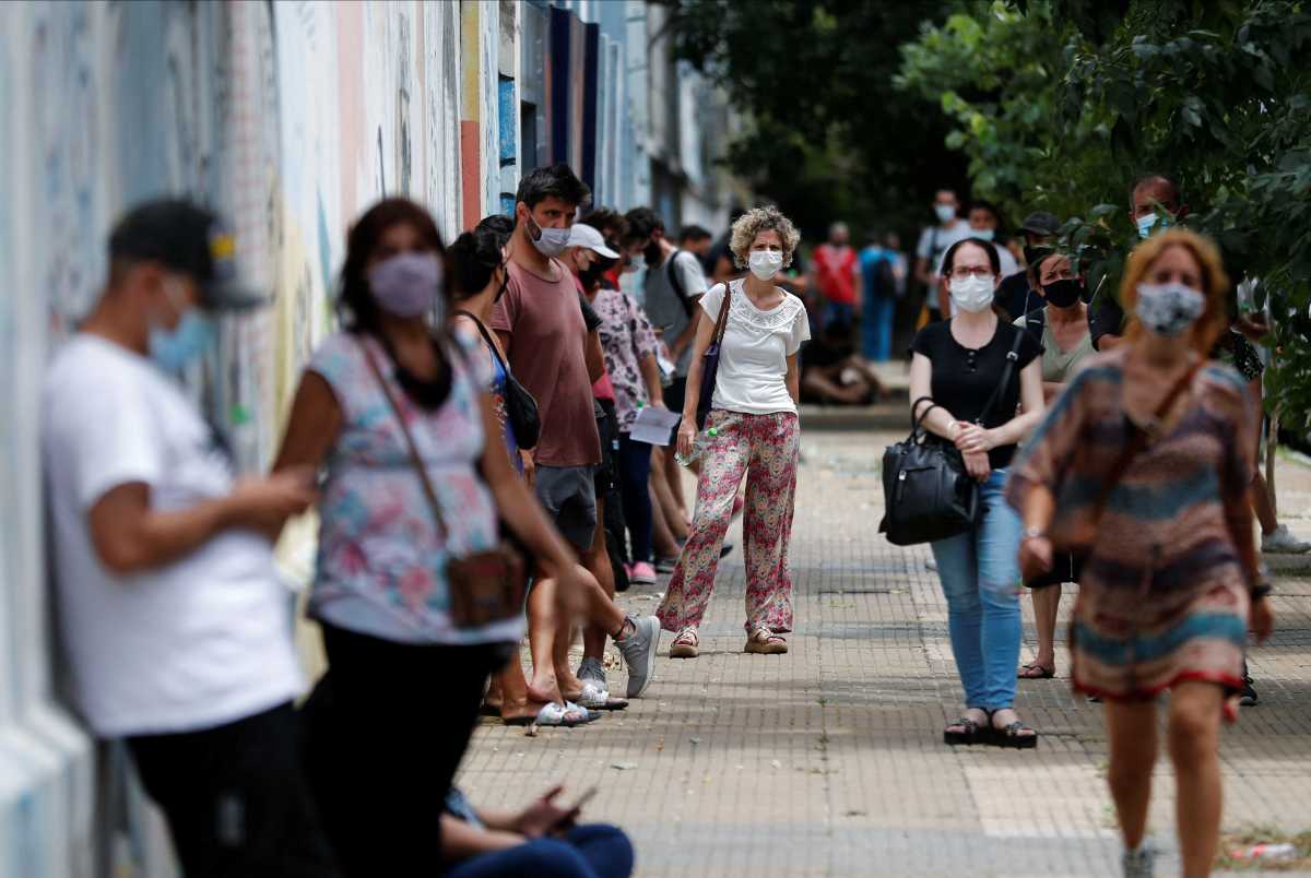 People wait in line to be tested for the coronavirus disease (COVID-19) amid a spike in the cases, outside the Hospital Pirovano, in Buenos Aires, Argentina January 4, 2022. REUTERS