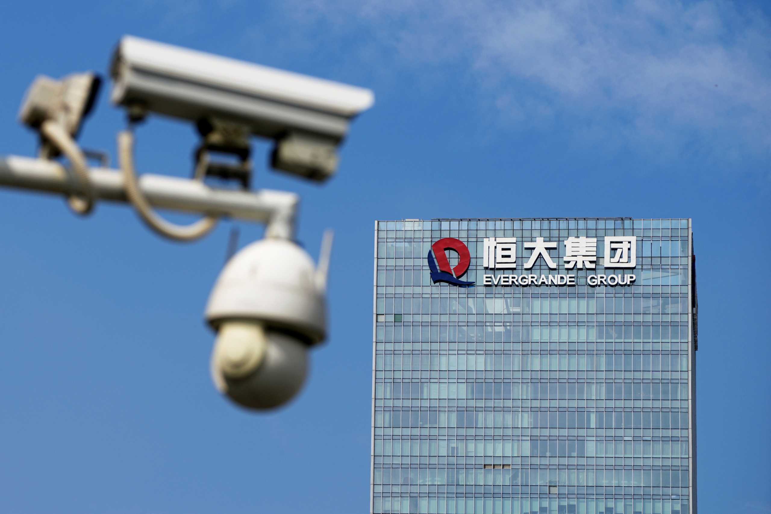 FILE PHOTO: Surveillance cameras are seen near the headquarters of China Evergrande Group in Shenzhen, Guangdong province, China September 26, 2021. REUTERS