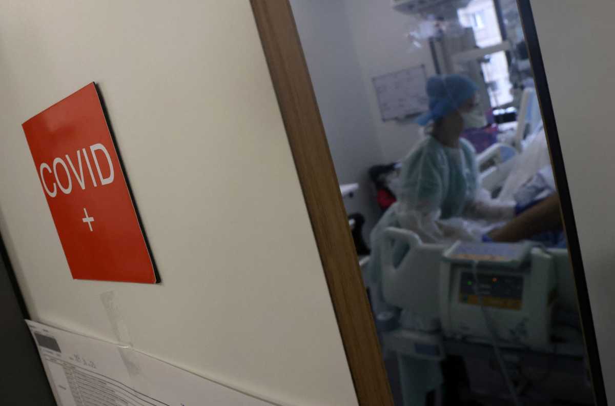 A medical personnel works at the Intensive Care Unit (ICU) for COVID-19 patients at "Hopitaux Civils de Colmar" in Colmar, France, December 15, 2021. REUTERS