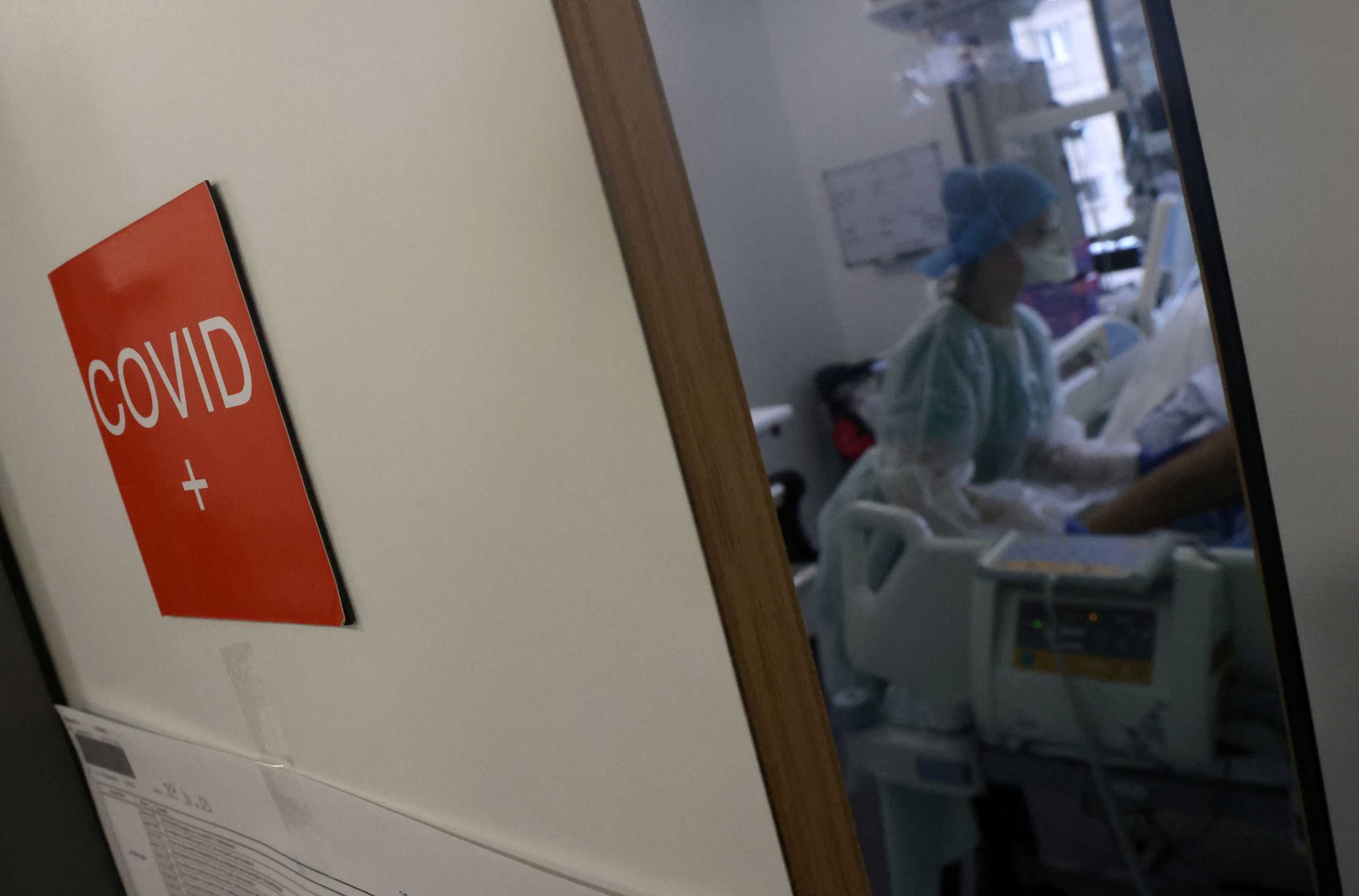 A medical personnel works at the Intensive Care Unit (ICU) for COVID-19 patients at "Hopitaux Civils de Colmar" in Colmar, France, December 15, 2021. REUTERS