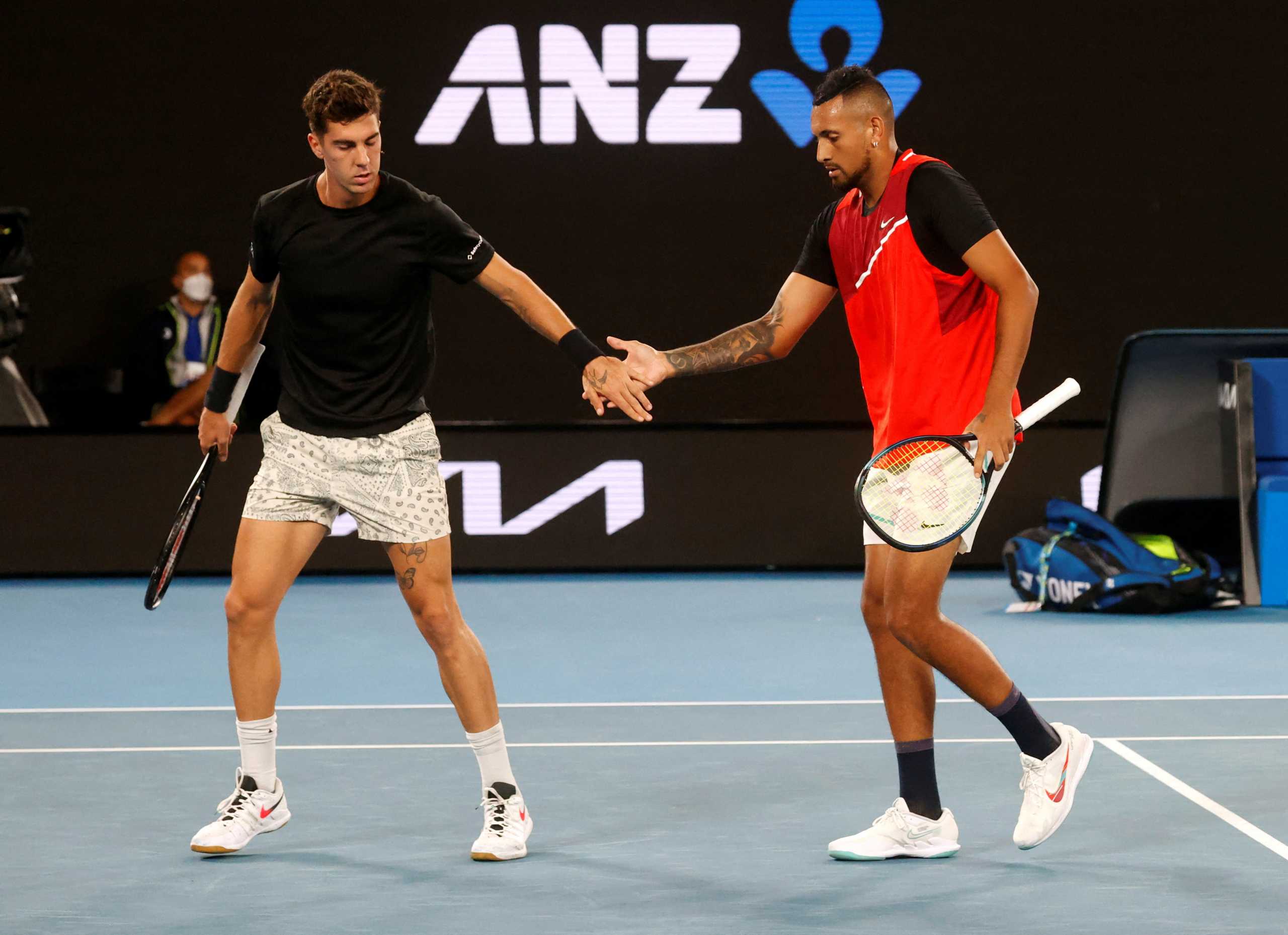 Tennis - Australian Open - Men's Doubles Final - Melbourne Park, Melbourne, Australia - January 29, 2022 Australia's Nick Kyrgios and Thanasi Kokkinakis during the final against Australia's Matthew Ebden and Max Purcell REUTERS