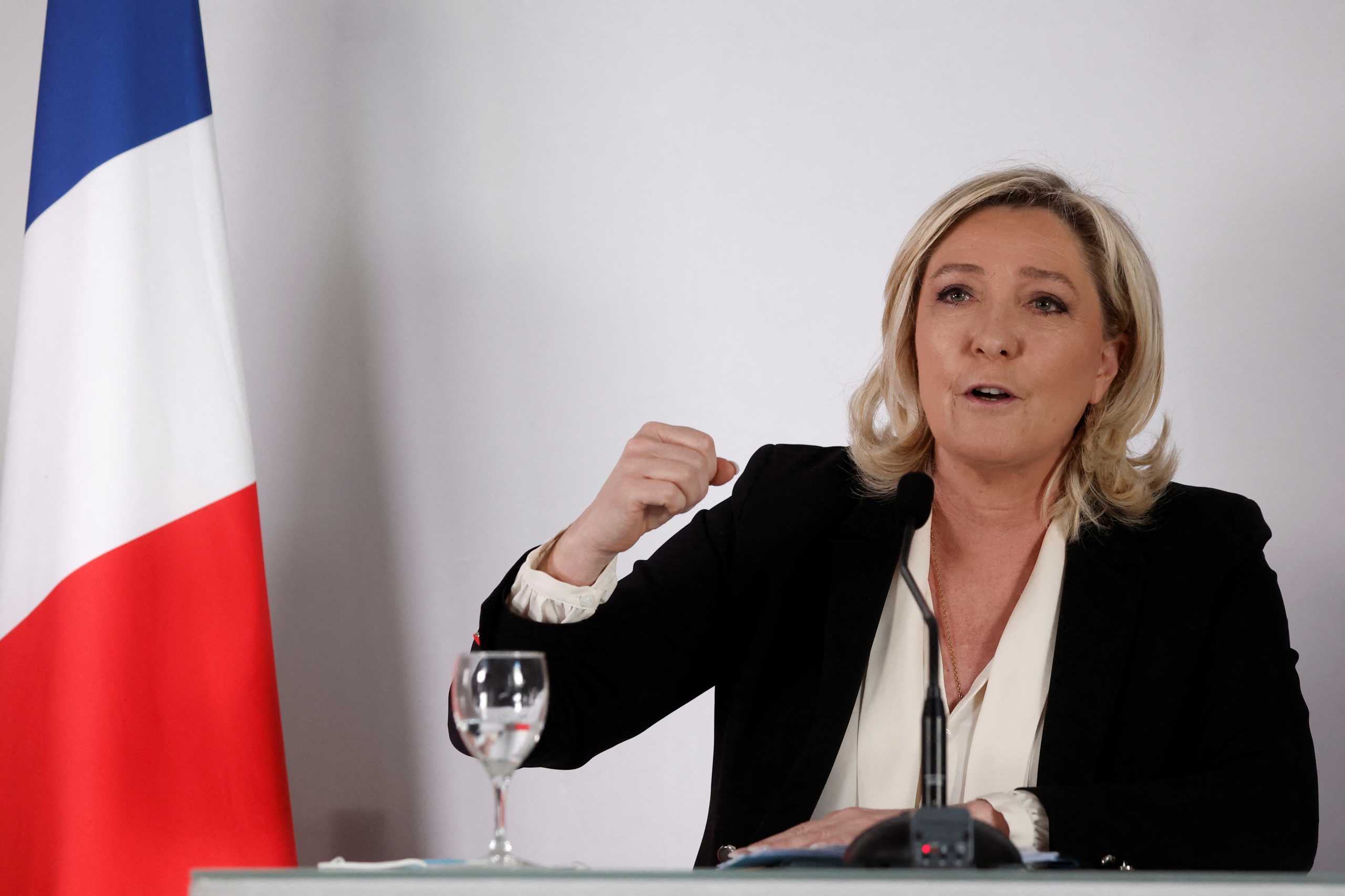 Marine Le Pen, leader of French far-right National Rally (Rassemblement National) party and candidate for the 2022 French presidential election, gives a news conference over the 6-month French presidency of the European Union in Paris, France, January 18, 2022. REUTERS