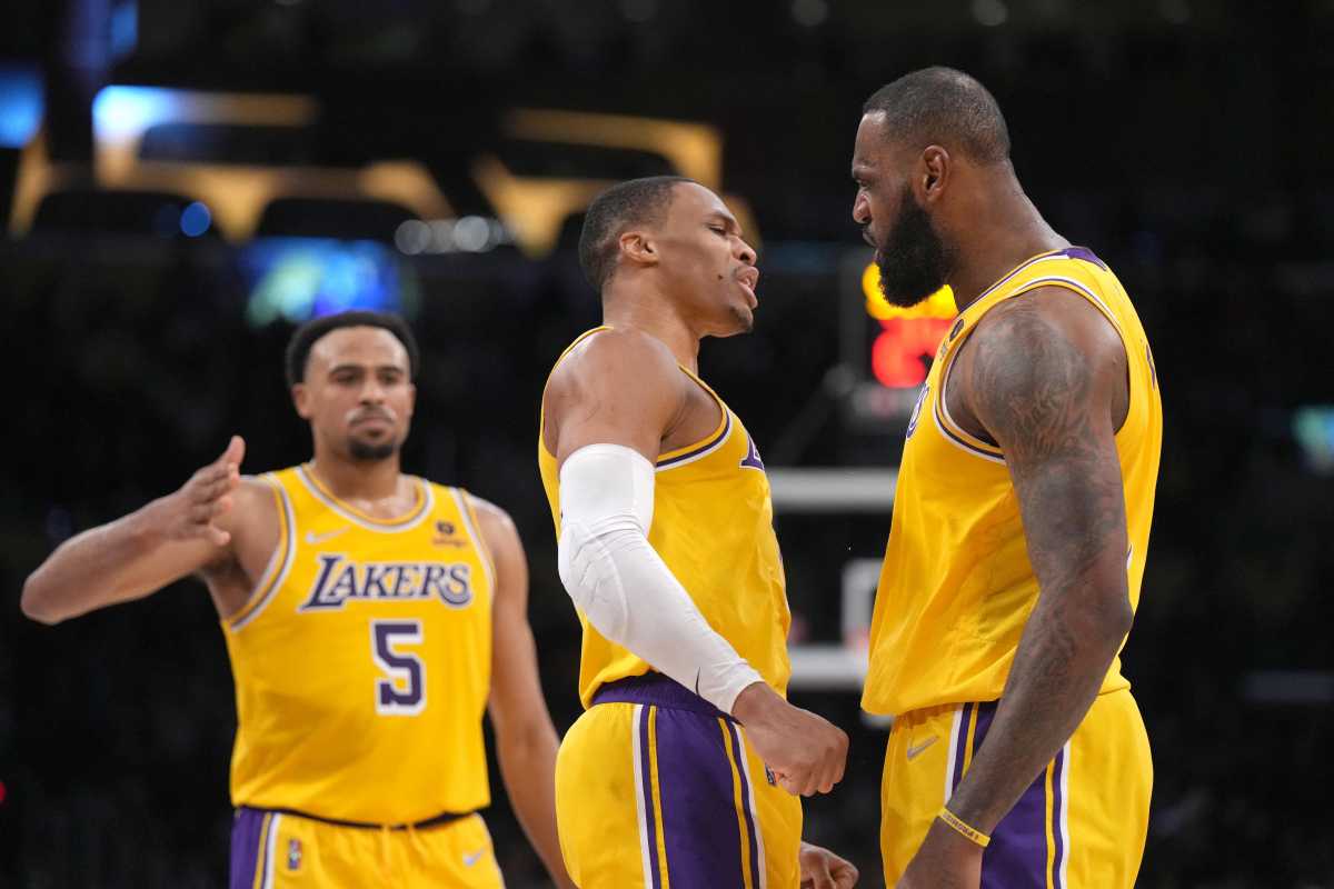 Jan 4, 2022; Los Angeles, California, USA; Los Angeles Lakers forward LeBron James (6) celebrates with guard Russell Westbrook (0) and guard Talen Horton-Tucker (5) against the Sacramento Kings in the second half at Crypto.com Arena. Mandatory Credit: Kirby Lee-USA TODAY Sports