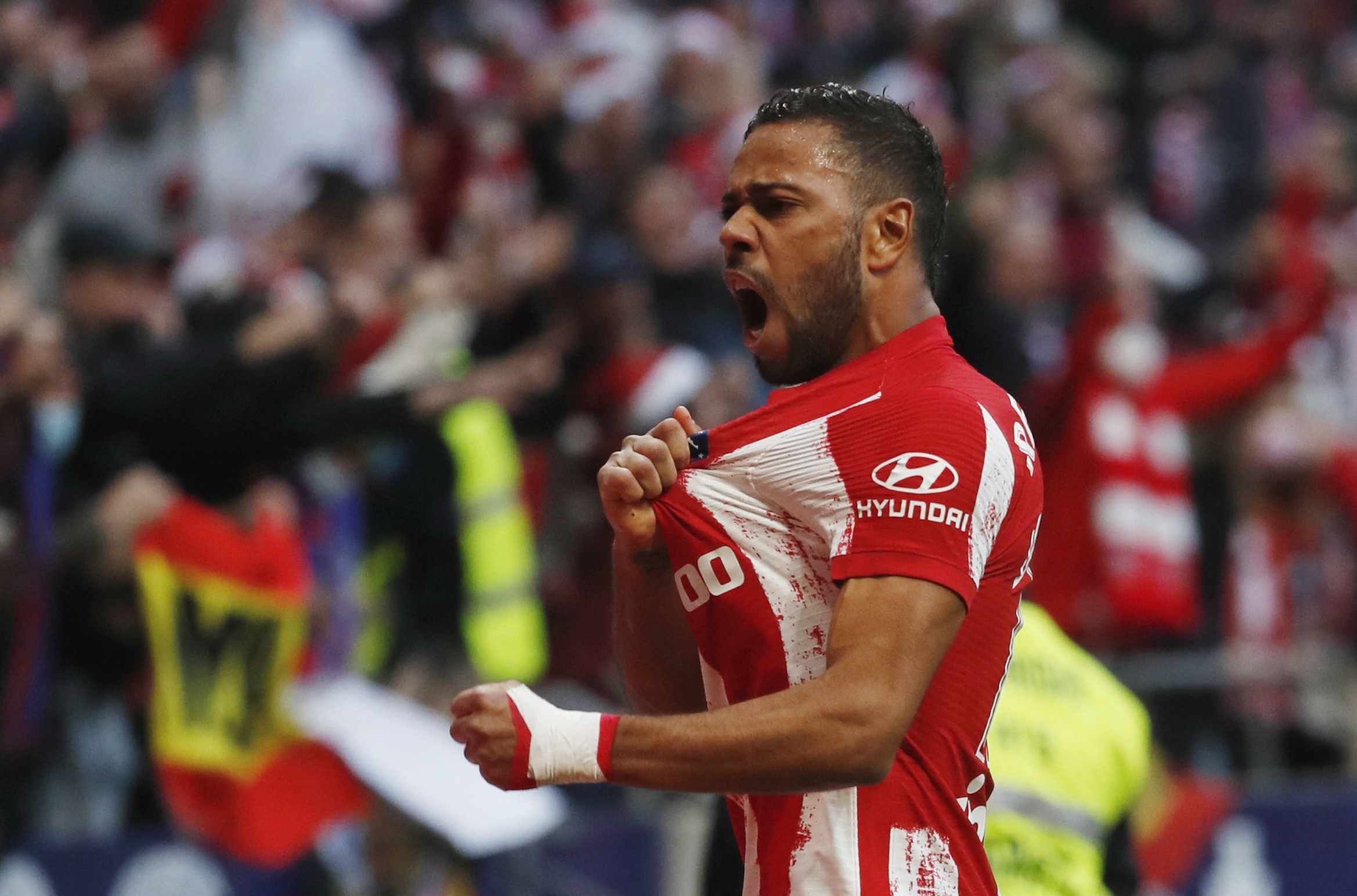 Soccer Football - LaLiga - Atletico Madrid v Rayo Vallecano - Wanda Metropolitano, Madrid, Spain - January 2, 2022 Atletico Madrid's Renan Lodi celebrates their second goal scored by Angel Correa REUTERS