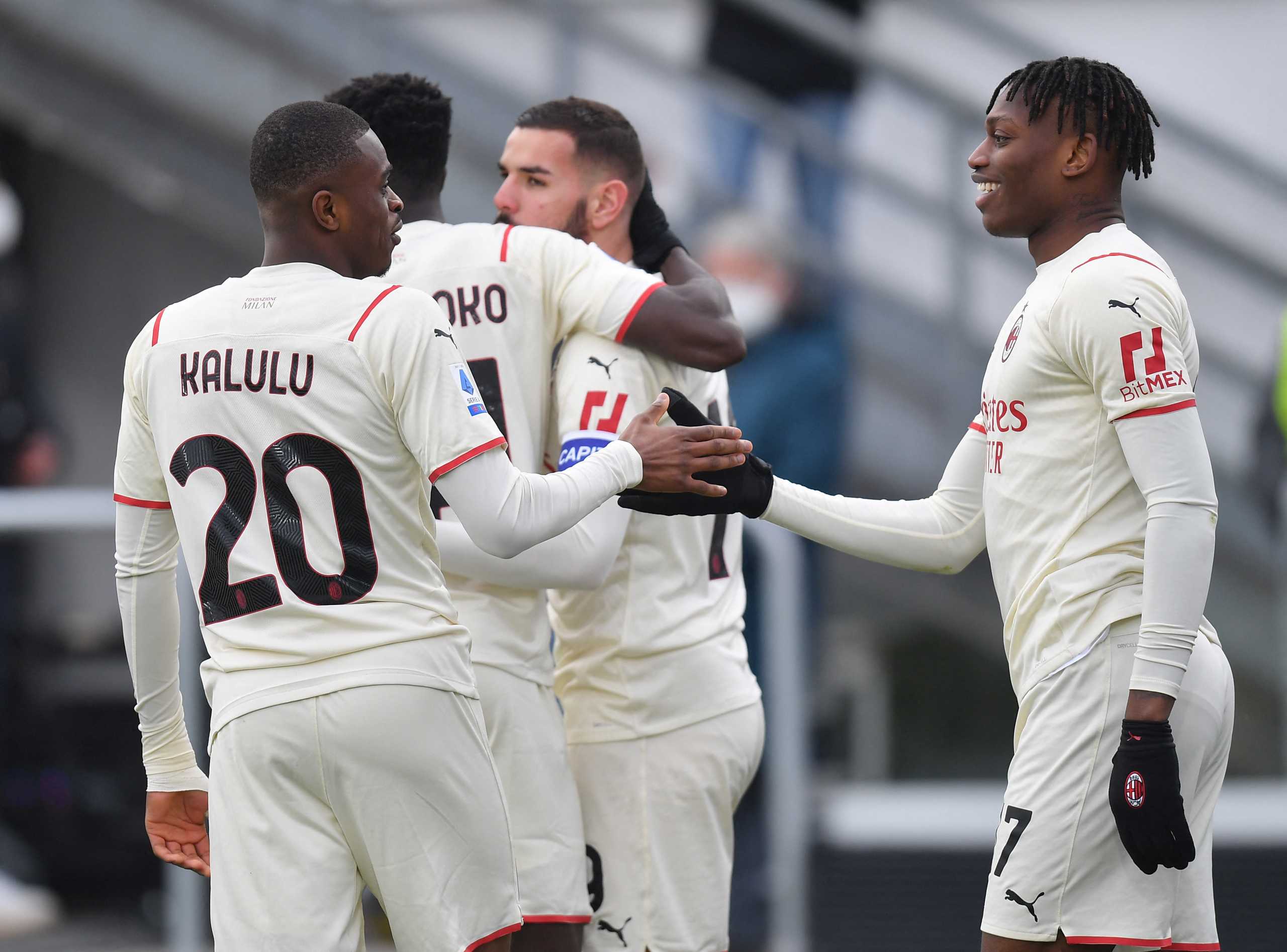 Soccer Football - Serie A - Venezia v AC Milan - Stadio Pier Luigi Penzo, Venice, Italy - January 9, 2022 AC Milan's Theo Hernandez celebrates scoring their second goal with teammates REUTERS