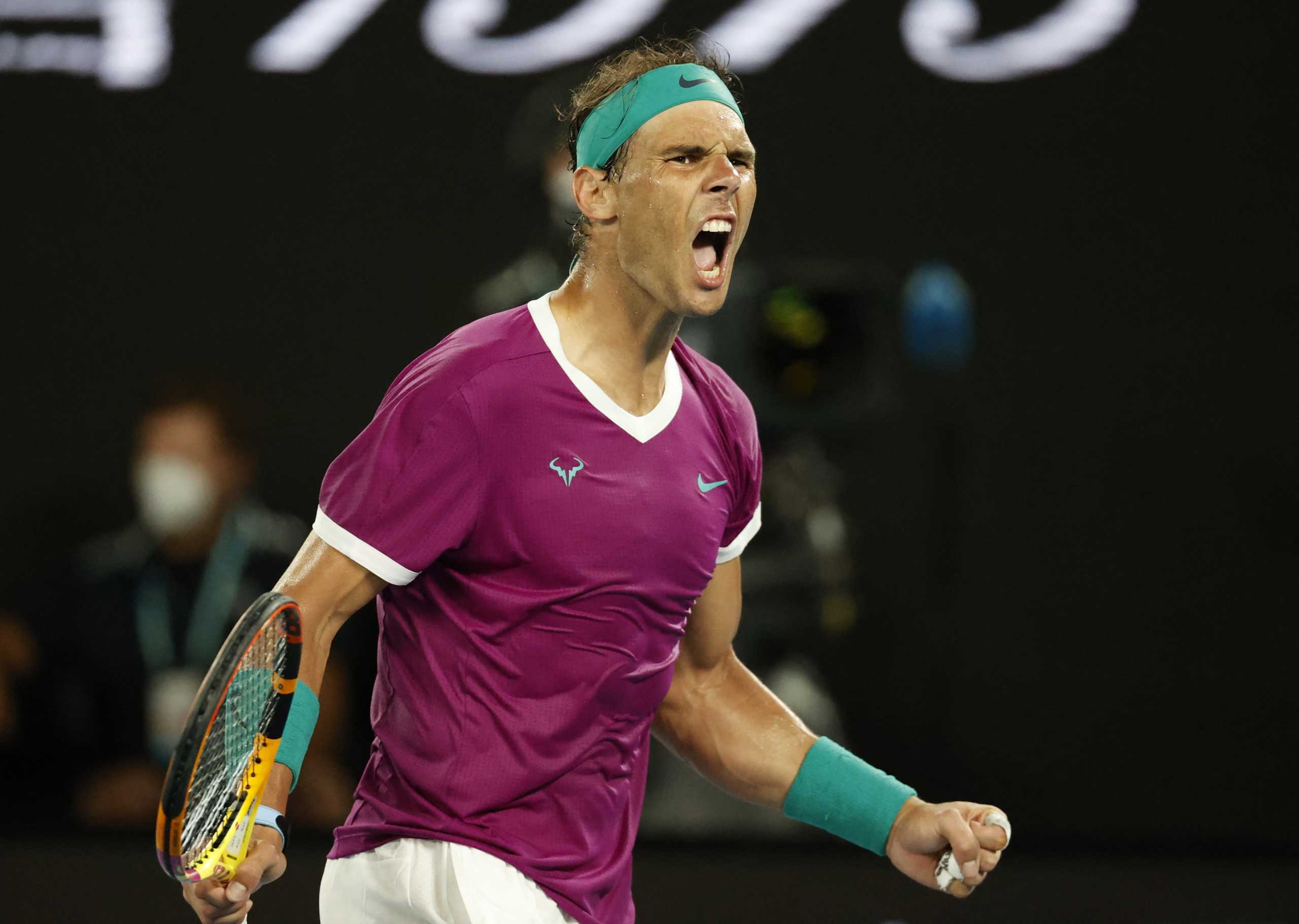 Tennis - Australian Open - Men's Singles Final - Melbourne Park, Melbourne, Australia - January 30, 2022 Spain's Rafael Nadal celebrates winning the third set during the final against Russia's Daniil Medvedev REUTERS