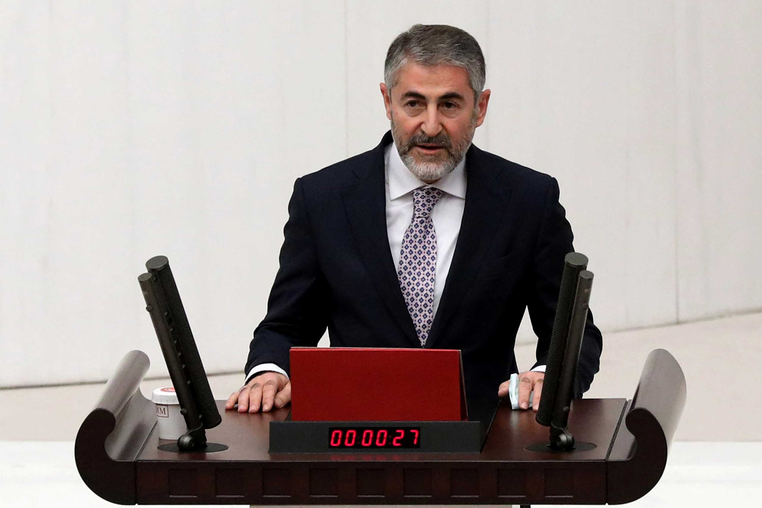 Turkey's new Finance Minister Nureddin Nebati takes his oath at the Parliament in Ankara, Turkey December 2, 2021. Picture taken December 2, 2021. REUTERS