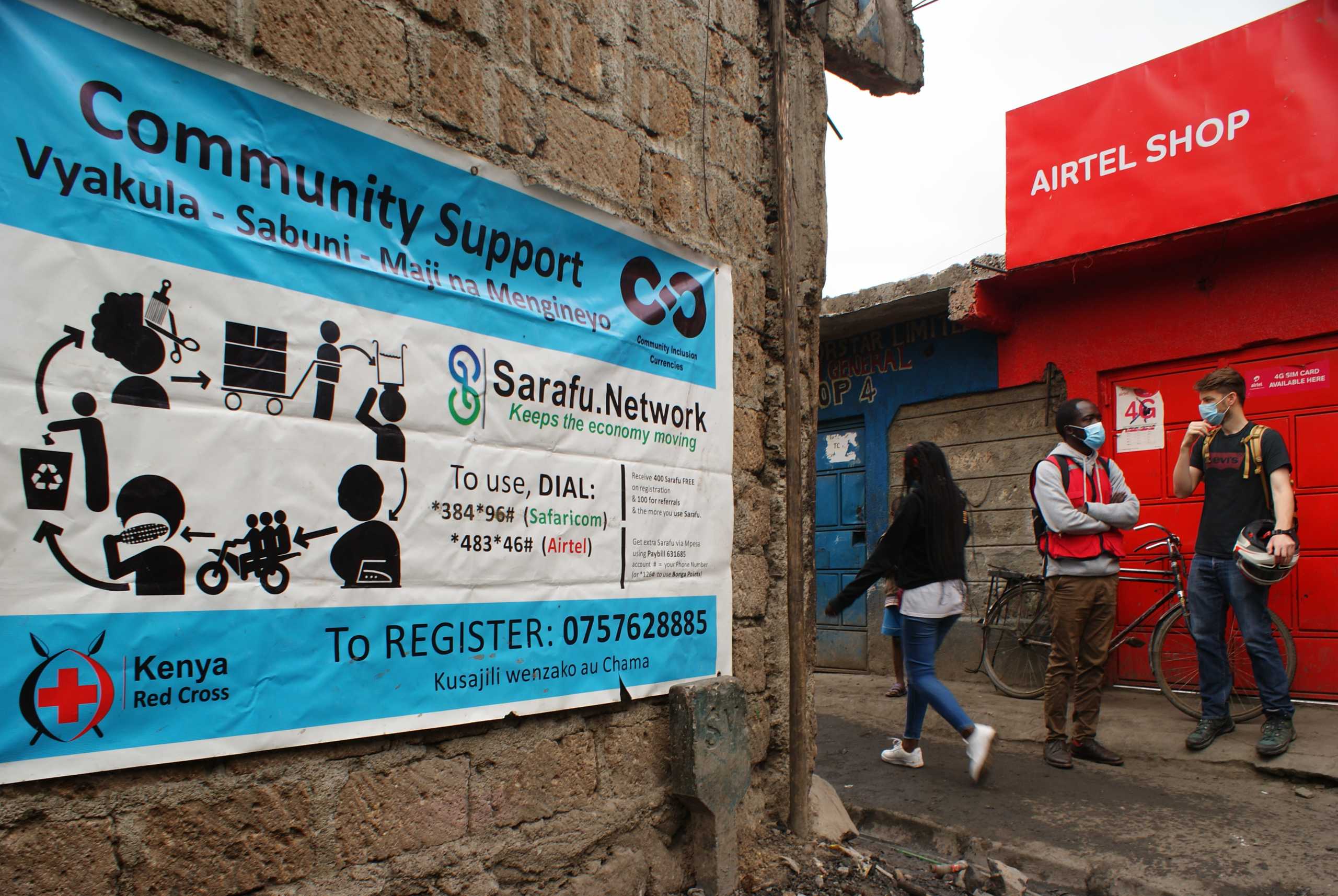 Signage for Sarafu on the streets of Mukuru Kayiaba slum in Nairobi, Kenya, July 28, 2020. Thomson Reuters Foundation