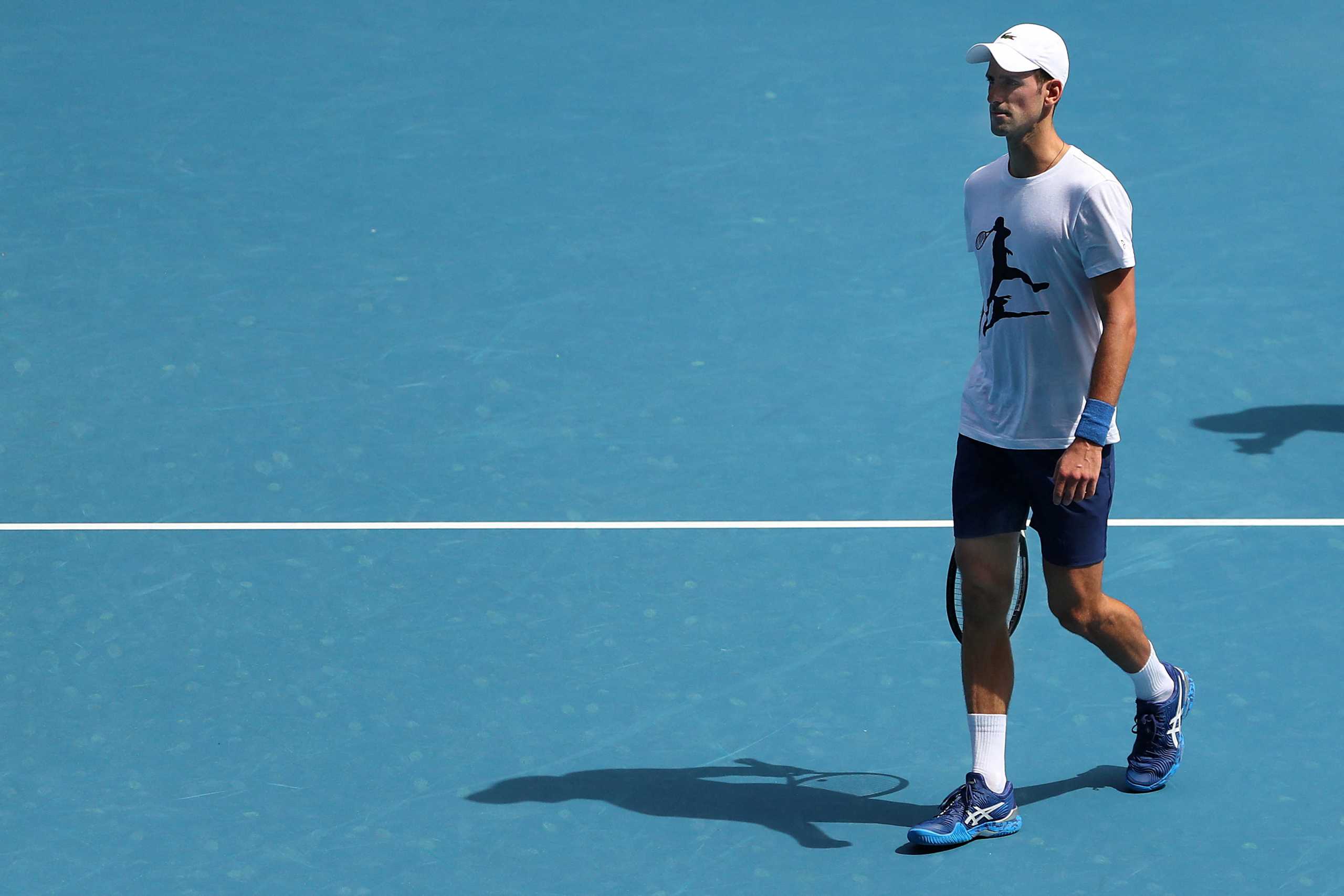Serbian tennis player Novak Djokovic practices on Rod Laver Arena ahead of the 2022 Australian Open at Melbourne Park, in Melbourne, Australia, January 11, 2022. Kelly Defina