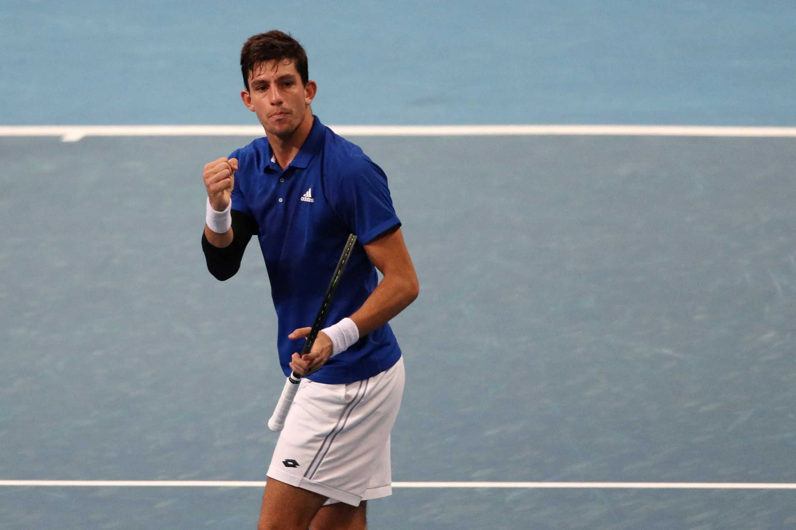 Tennis - ATP Cup - Sydney Olympic Park, Sydney, Australia - January 1, 2022  Greece's Michail Pervolarakis reacts during his doubles group stage match against Poland's Hubert Hurkacz and Jan Zielinski REUTERS