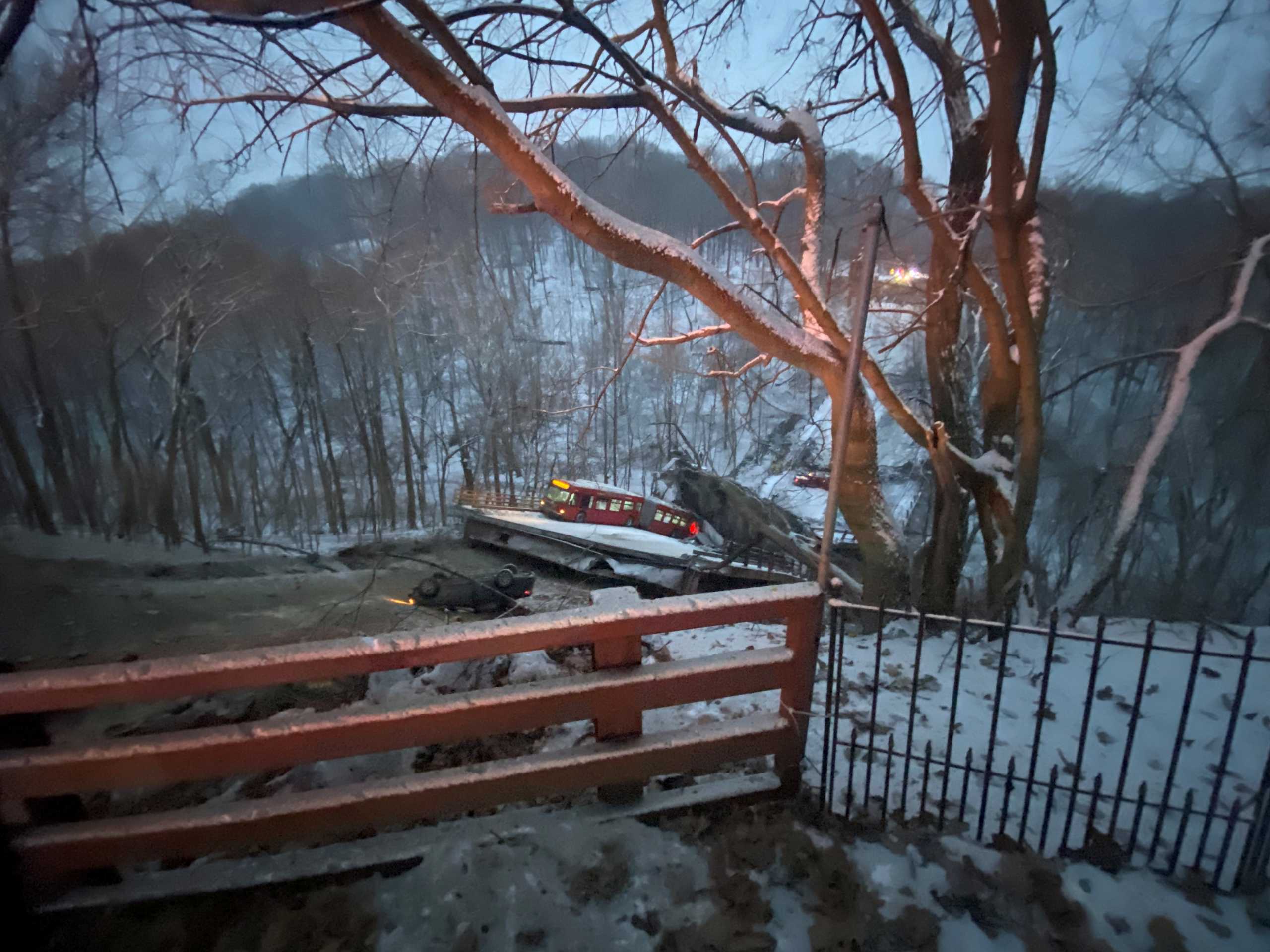 A general view shows the collapsed bridge in Pittsburgh, Pennsylvania, U.S. January 28, 2022, in this image obtained from social media. Greg Barnhisel via REUTERS NO RESALES. NO ARCHIVES MANDATORY CREDIT THIS IMAGE HAS BEEN SUPPLIED BY A THIRD PARTY.