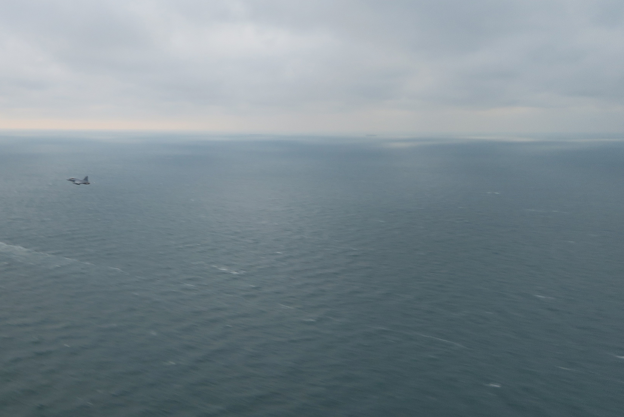Russian military landing vessels are seen from a plane as they enter the Baltic Sea January 11, 2022. Picture taken January 11, 2022. Swedish Armed Forces