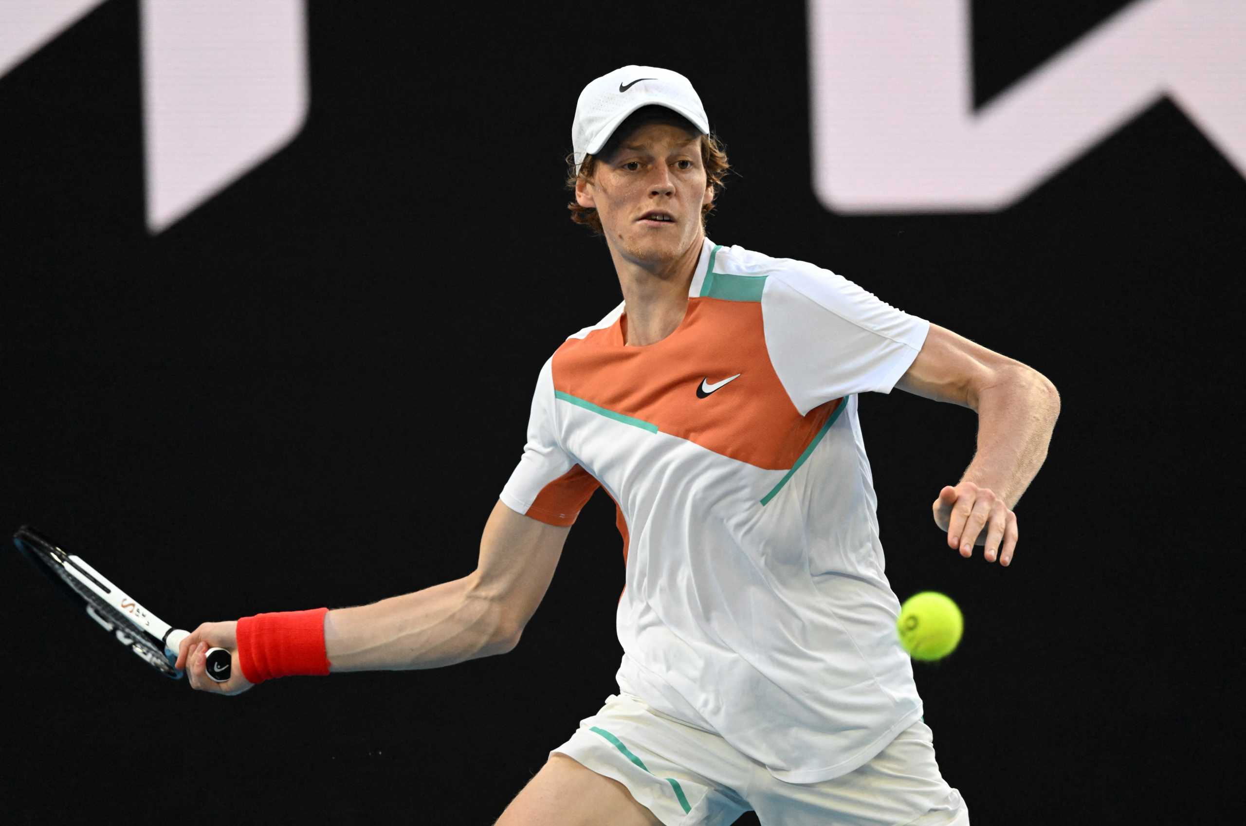 Tennis - Australian Open - Melbourne Park, Melbourne, Australia - January 24, 2022  Italy's Jannik Sinner in action during his fourth round match against Australia's Alex de Minaur REUTERS