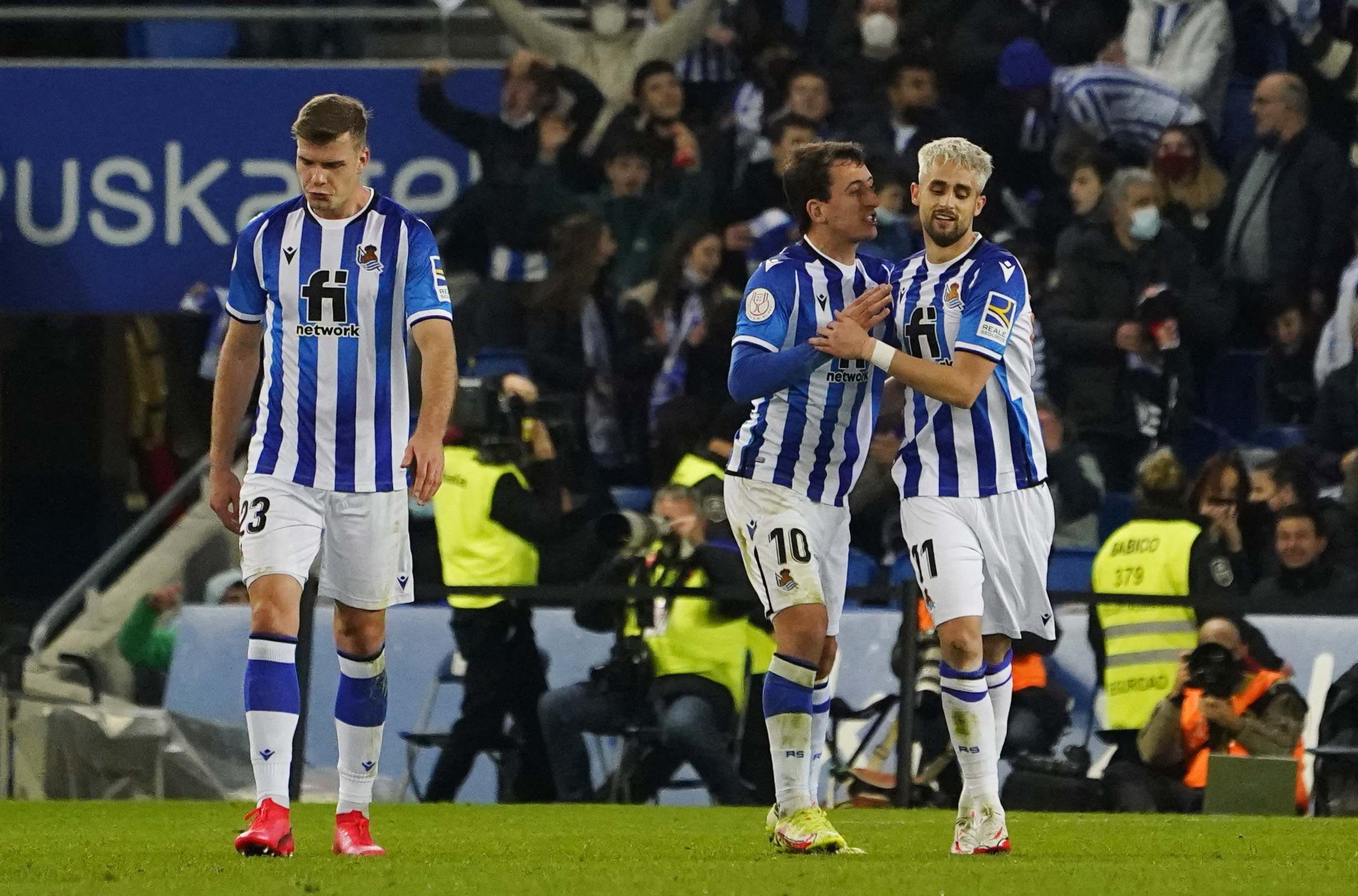Soccer Football - Copa del Rey - Round of 16 - Real Sociedad v Atletico Madrid - Reale Arena, San Sebastian, Spain - January 19, 2022 Real Sociedad's Adnan Januzaj celebrates scoring their first goal with  Mikel Oyarzabal REUTERS