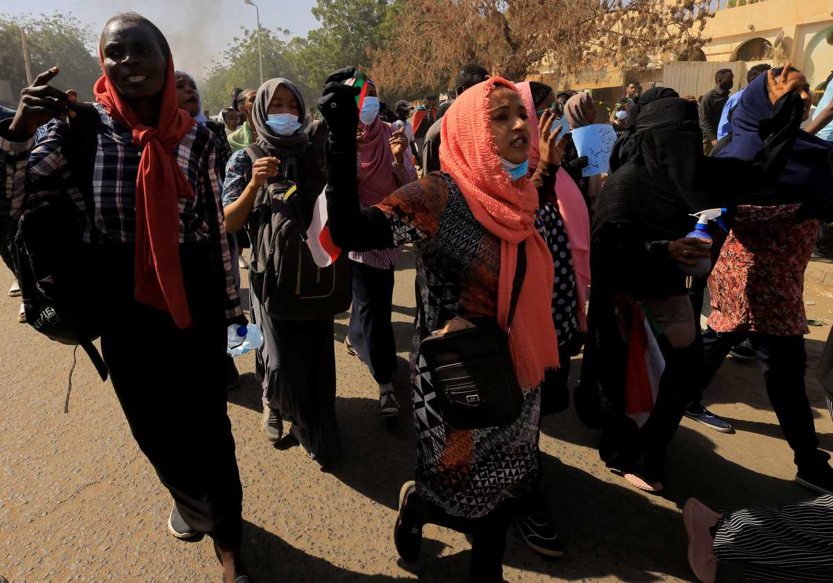 Protesters march during a rally against the military rule following last month's coup in Khartoum, Sudan, January 9, 2022. REUTERS