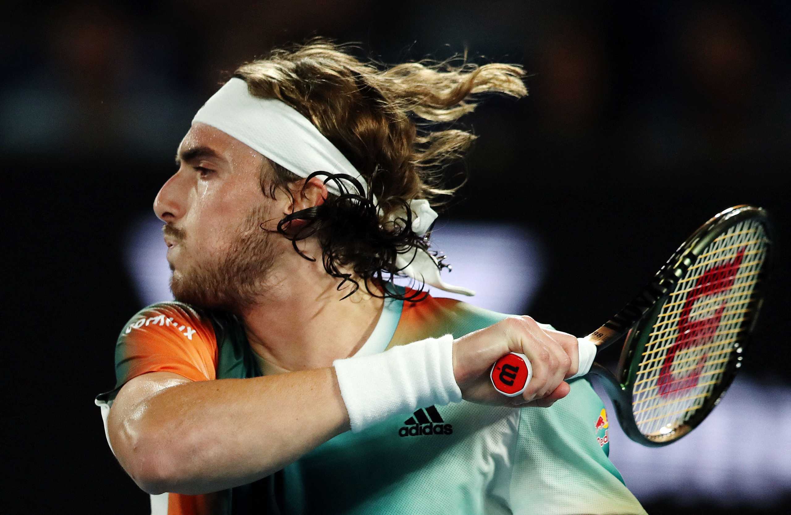 Tennis - Australian Open - Melbourne Park, Melbourne, Australia - January 18, 2022 Greece's Stefanos Tsitsipas in action during his first round match against Sweden's Mikael Ymer REUTERS