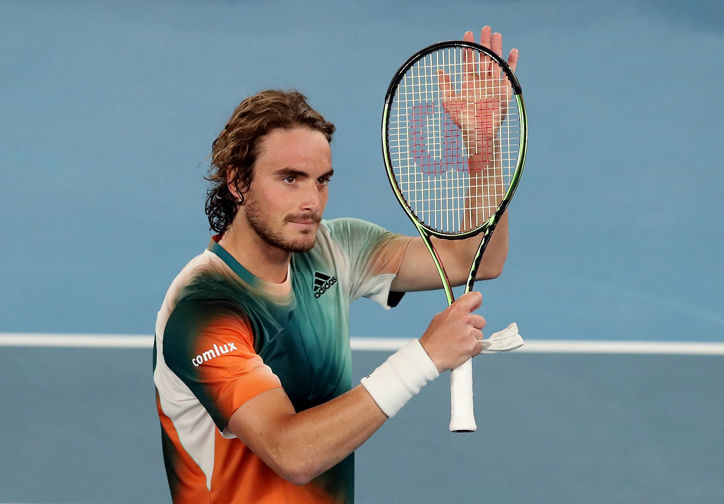Tennis - Australian Open - Melbourne Park, Melbourne, Australia - January 18, 2022 Greece's Stefanos Tsitsipas celebrates winning his first round match against Sweden's Mikael Ymer REUTERS