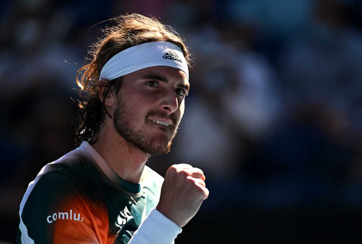 Tennis - Australian Open - Melbourne Park, Melbourne, Australia - January 22, 2022  Greece's Stefanos Tsitsipas reacts during his third round match against France's Benoit Paire REUTERS