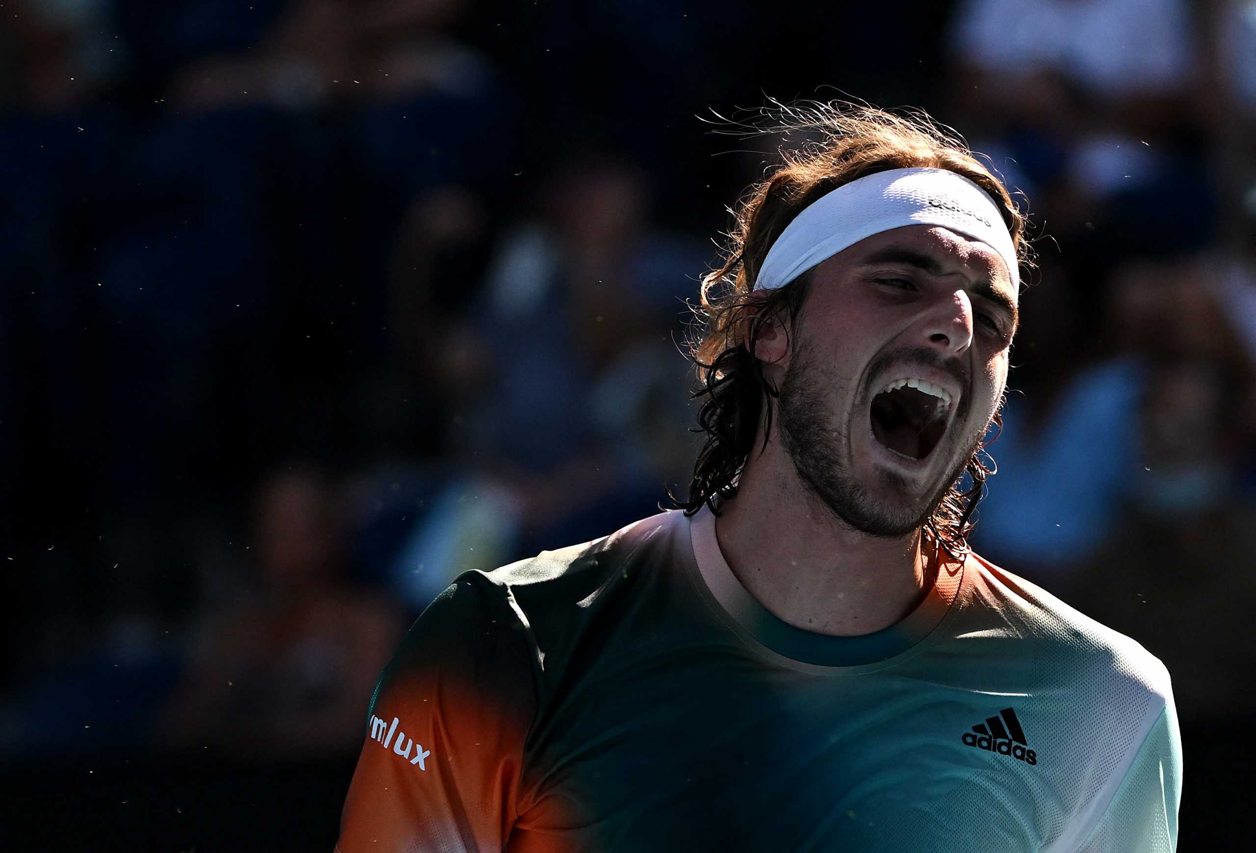 Tennis - Australian Open - Melbourne Park, Melbourne, Australia - January 22, 2022  Greece's Stefanos Tsitsipas reacts during his third round match against France's Benoit Paire REUTERS