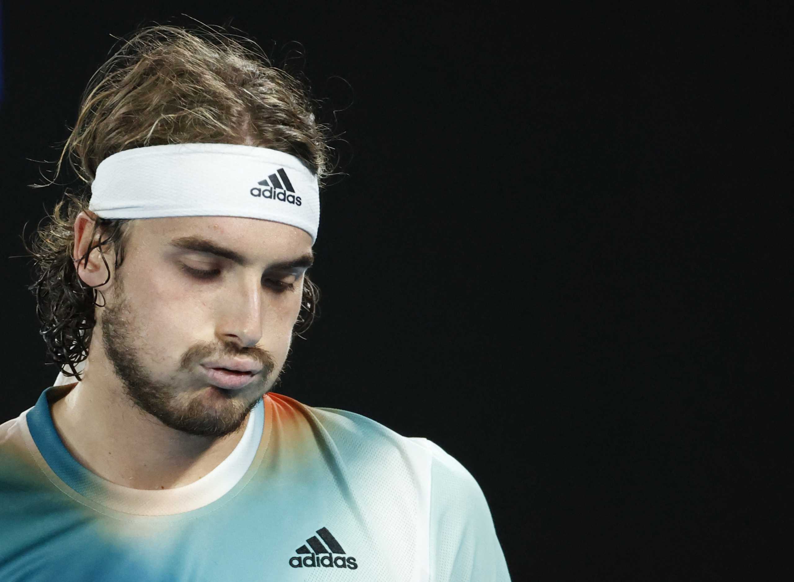 Tennis - Australian Open - Melbourne Park, Melbourne, Australia - January 28, 2022 Greece's Stefanos Tsitsipas reacts during his semi final match against Russia's Daniil Medvedev REUTERS