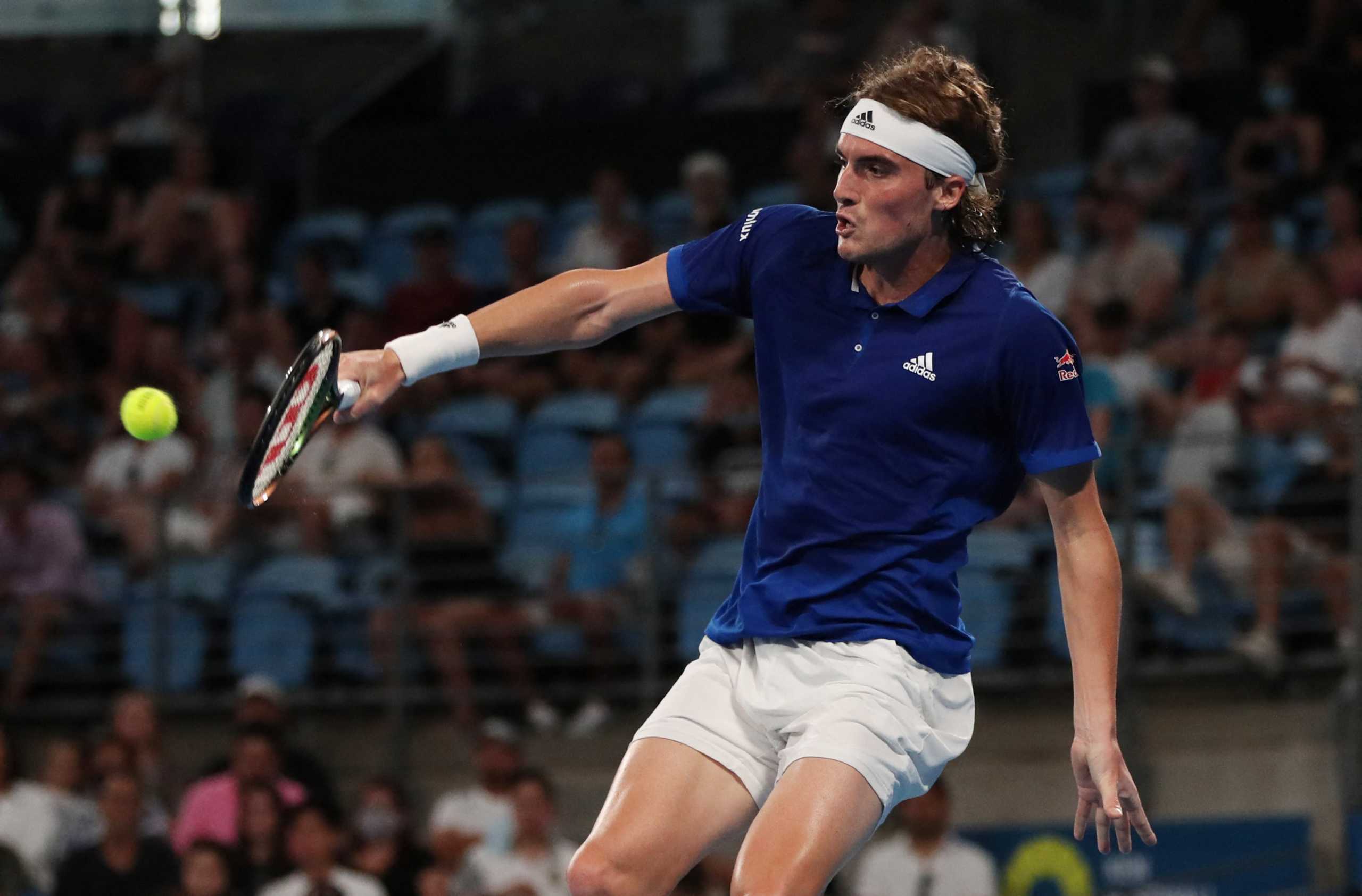 Tennis - ATP Cup - Sydney Olympic Park, Sydney, Australia - January 3, 2022  Greece's Stefanos Tsitsipas in action during his group stage match against Argentina's Diego Schwartzman REUTERS