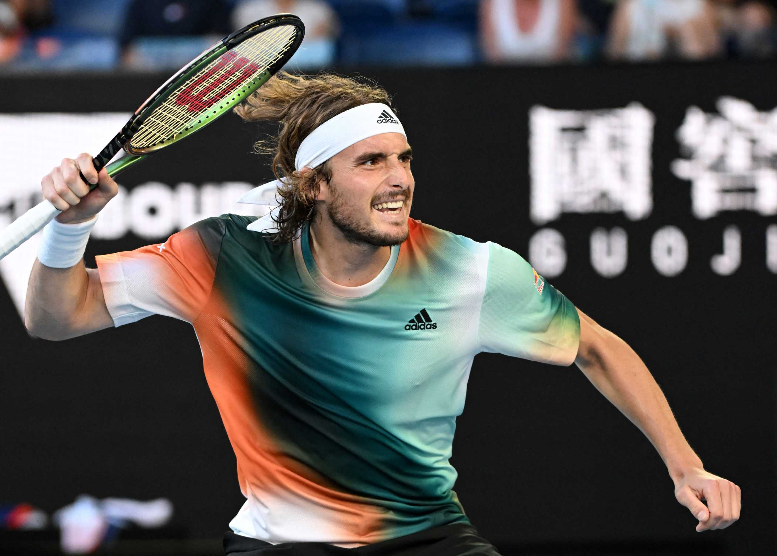 Tennis - Australian Open - Melbourne Park, Melbourne, Australia - January 22, 2022  Greece's Stefanos Tsitsipas celebrates winning his third round match against France's Benoit Paire REUTERS
