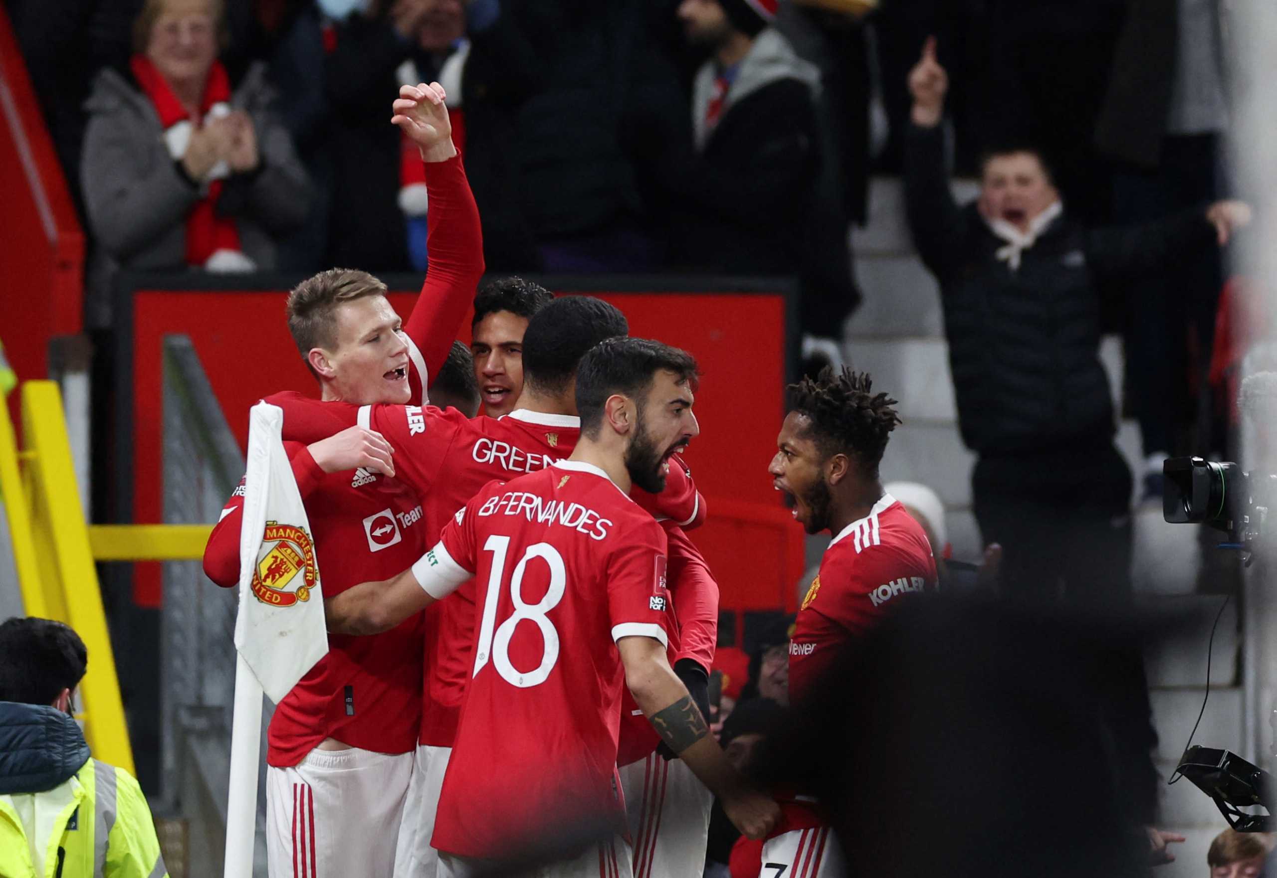 Soccer Football - FA Cup Third Round - Manchester United v Aston Villa - Old Trafford, Manchester, Britain - January 10, 2022 Manchester United's Scott McTominay celebrates scoring their first goal with teammates REUTERS