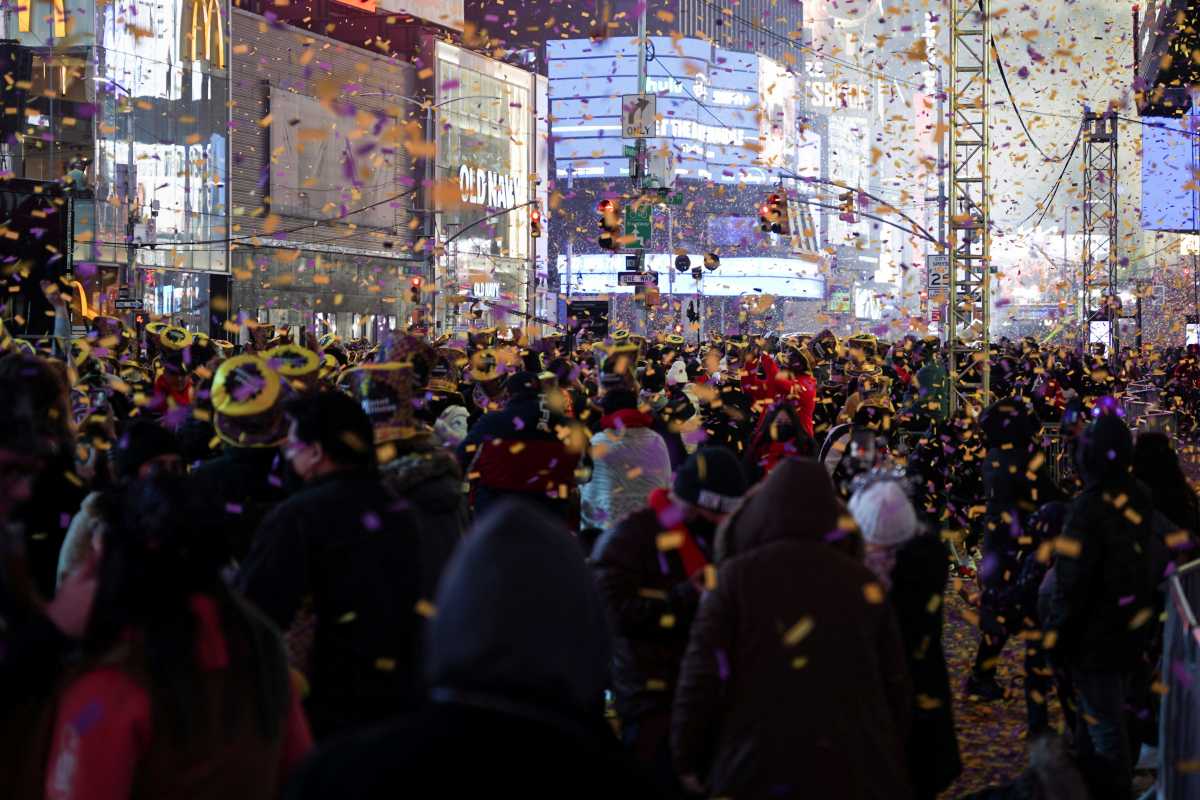 Revelers gather during New Year's Eve celebrations in Times Square, as the Omicron coronavirus variant continues to spread, in the Manhattan borough of New York City, U.S., December 31, 2021. REUTERS