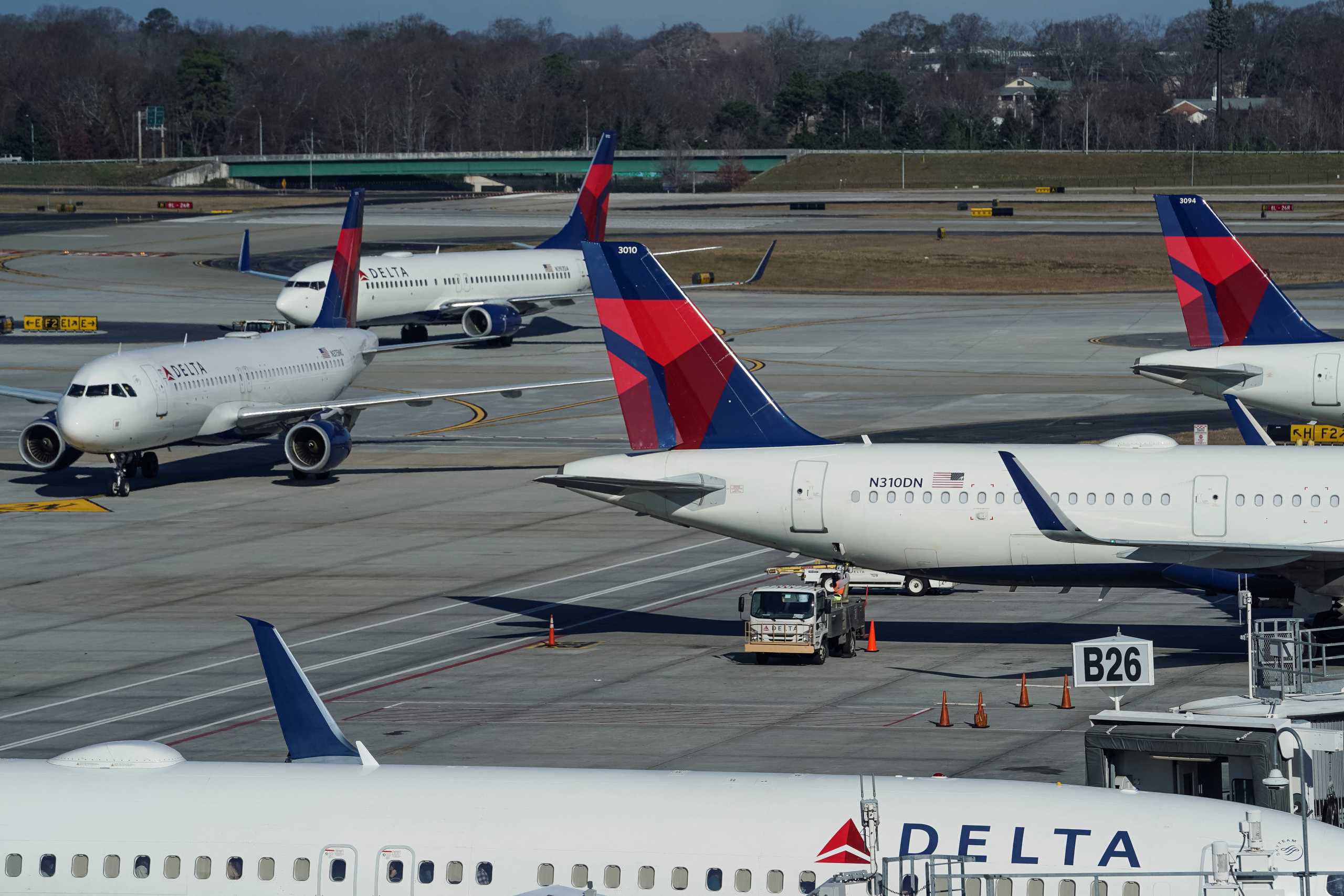 Delta Air Lines jets are seen on a taxiway at Hartsfield-Jackson Atlanta International Airport in Atlanta, Georgia, U.S. December 22, 2021. REUTERS